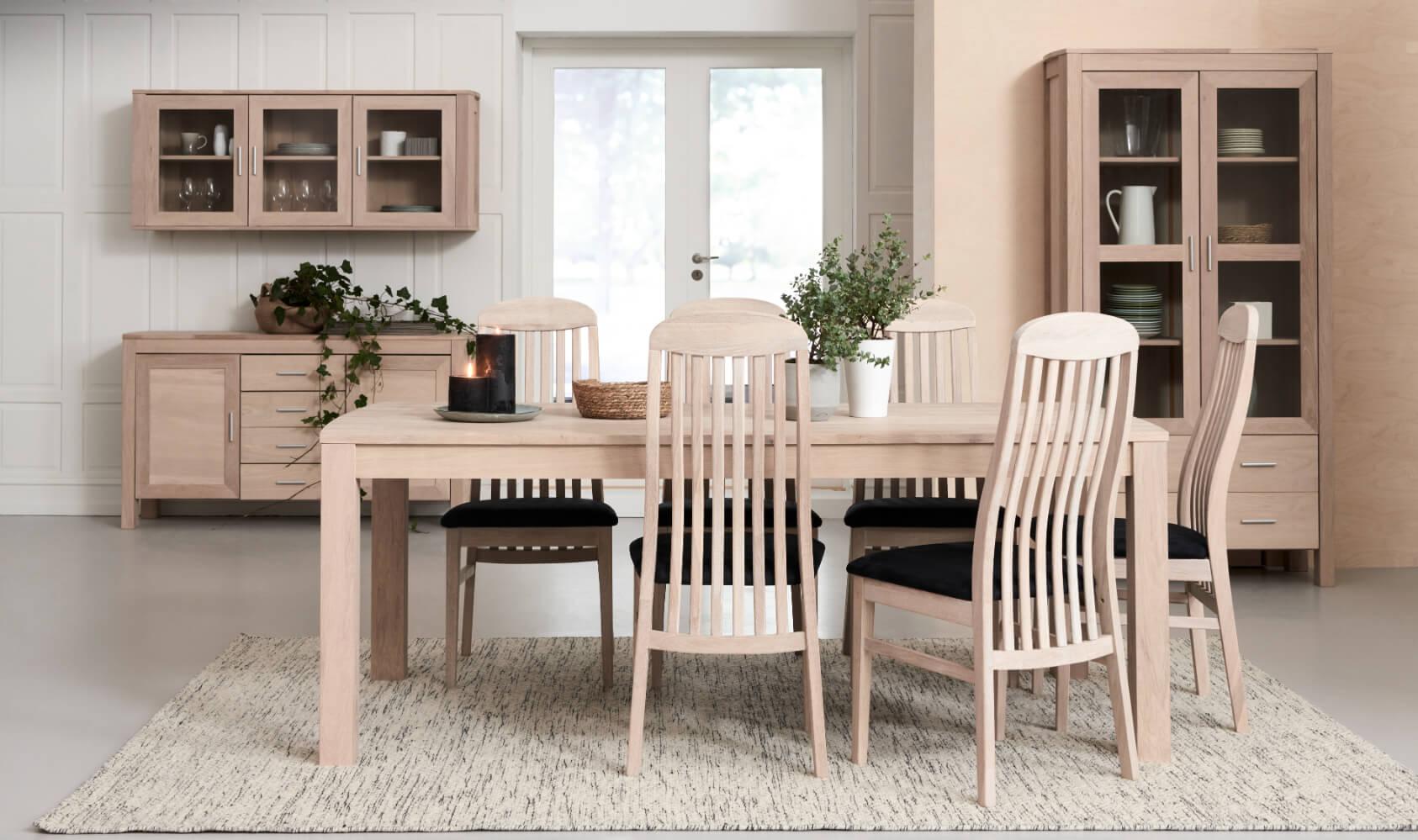 4-Door Sideboard Paris in solid oak finish showcasing minimalist design and natural wood variations.