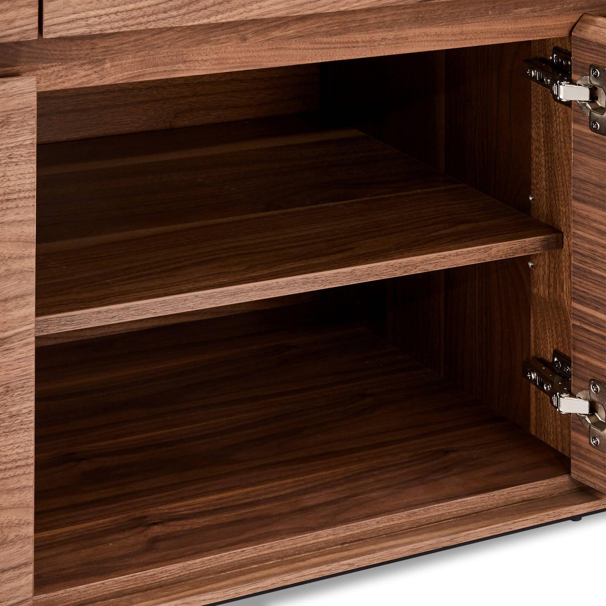 4-Door Sideboard Tokyo Walnut featuring American walnut wood and lacquered steel legs, showcasing a minimalist design with soft-closing doors.