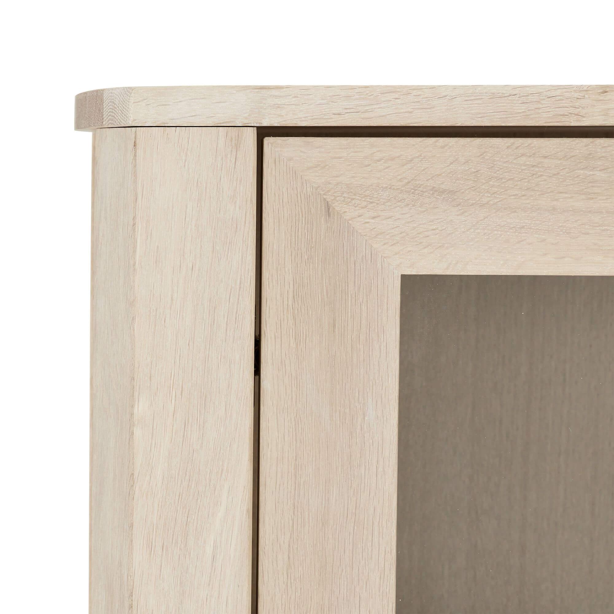 Elegant 4-Door Wall Cabinet in solid oak finish with clear glass doors, showcasing stylish storage for home interiors.