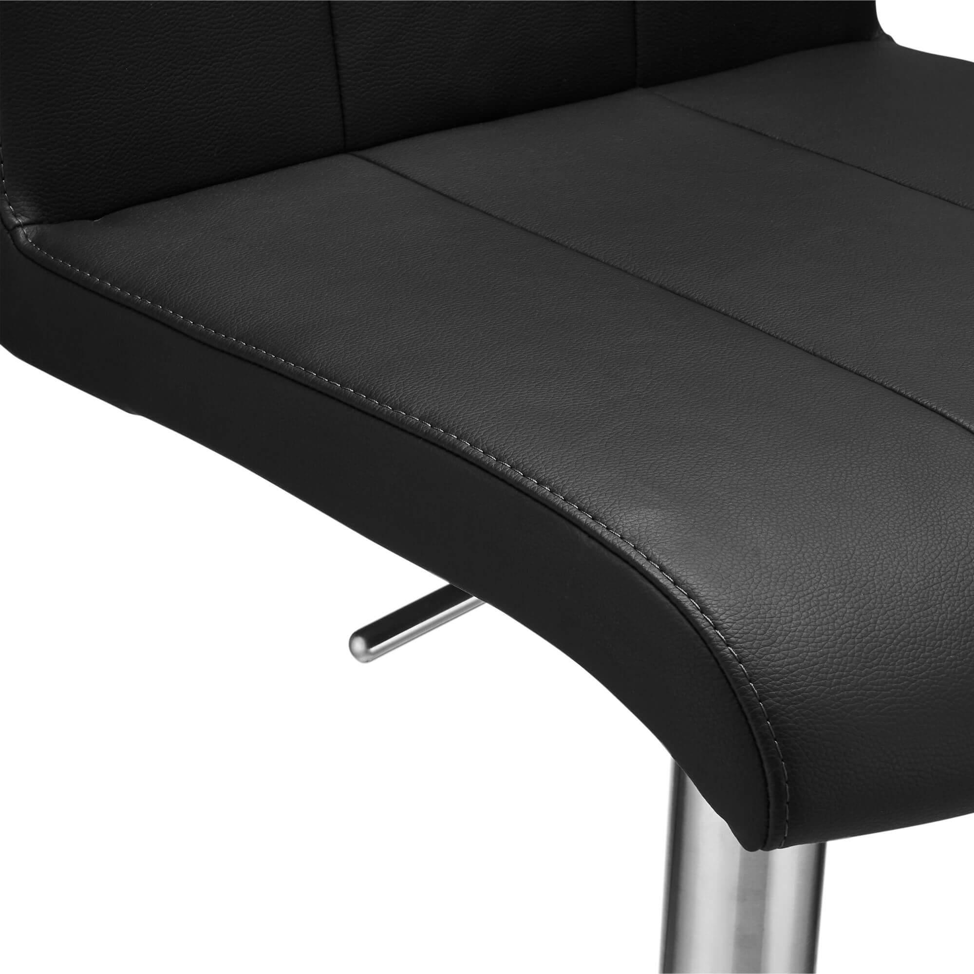 Stylish Black Bar Chairs Nikola with solid silver base and black faux leather upholstery, perfect for modern interiors.