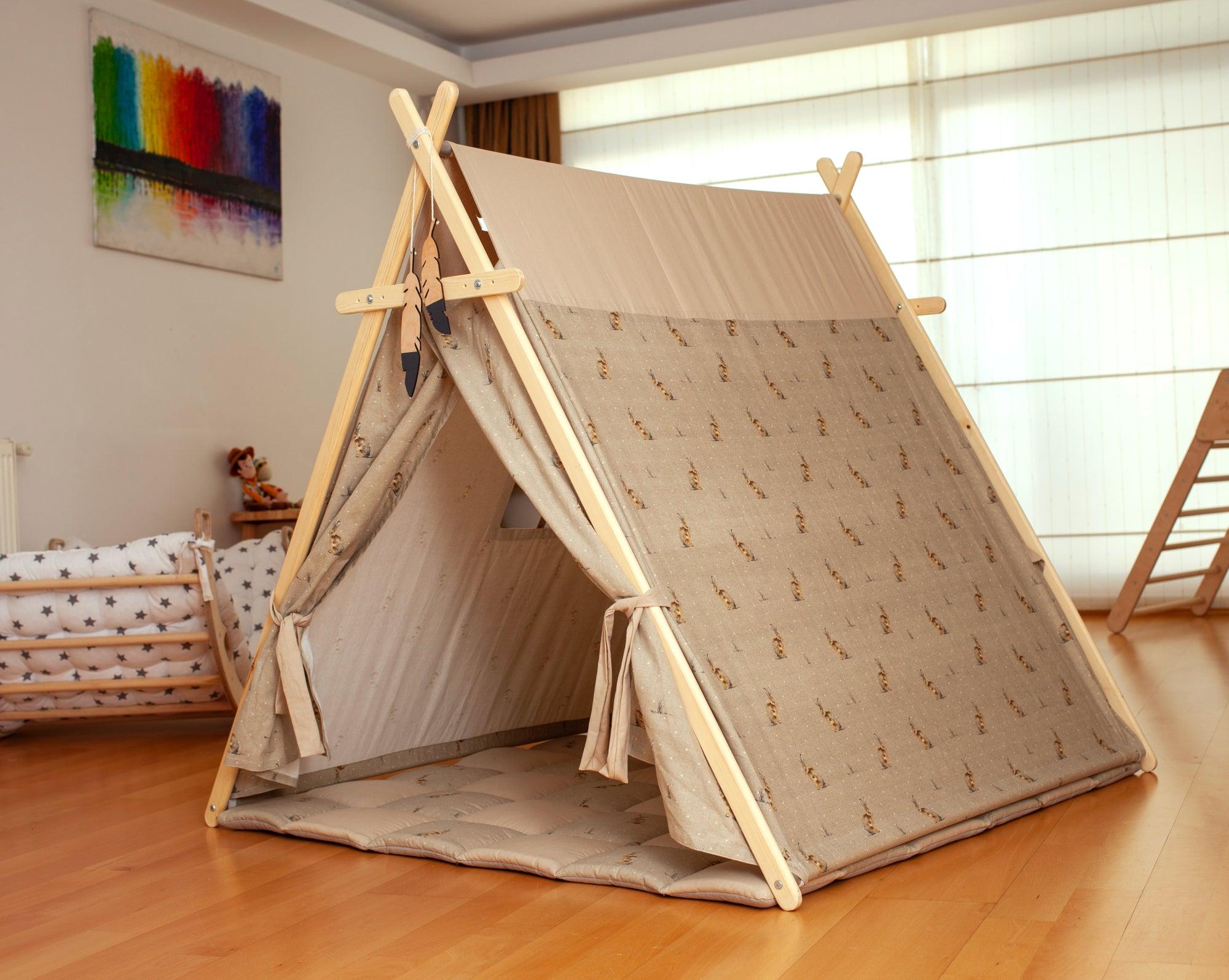 Bunny Play Tent and Play Mat for kids featuring a cute design, wooden poles, and star lights, perfect for indoor play.