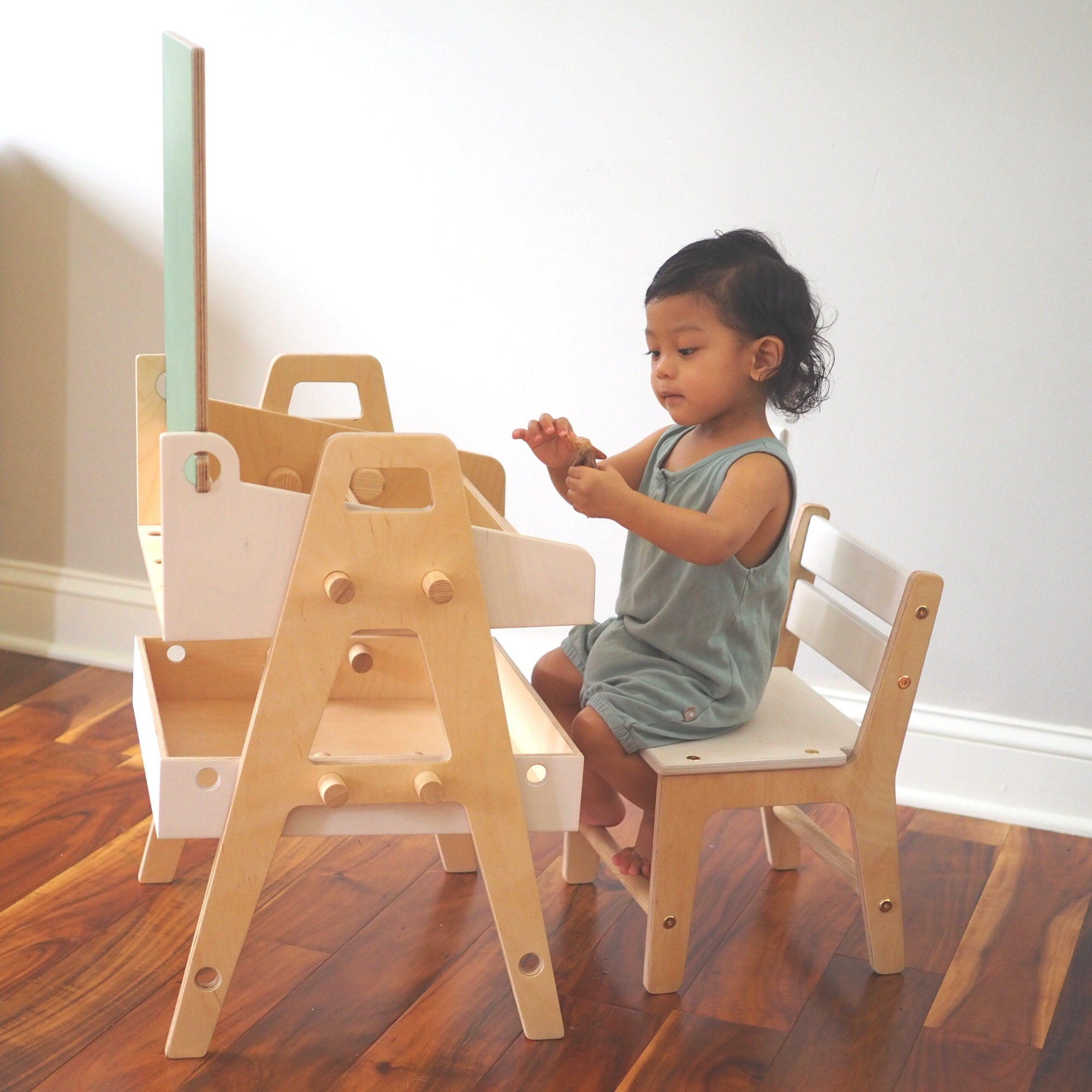 Montessori Chalkboard Art Table featuring a spacious chalkboard top and storage box for art supplies, designed for children's creativity.