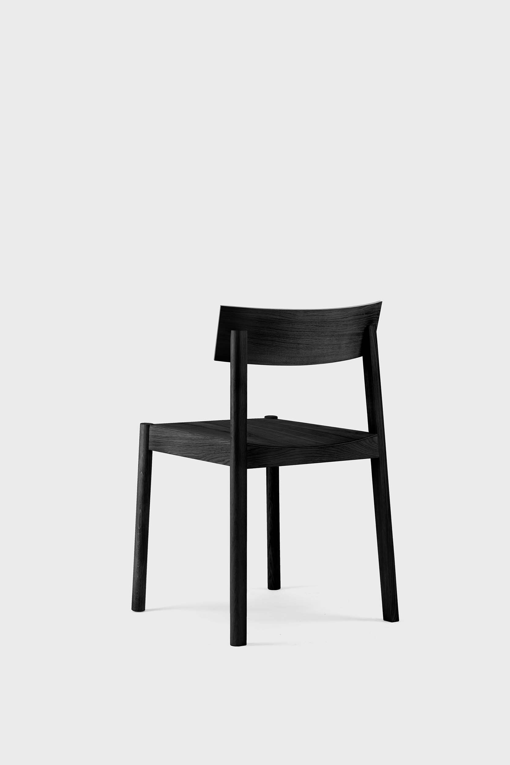 Citizen Dining Chair featuring a minimalist design with rounded legs and a square seat, crafted from sustainable solid oak and veneered plywood.