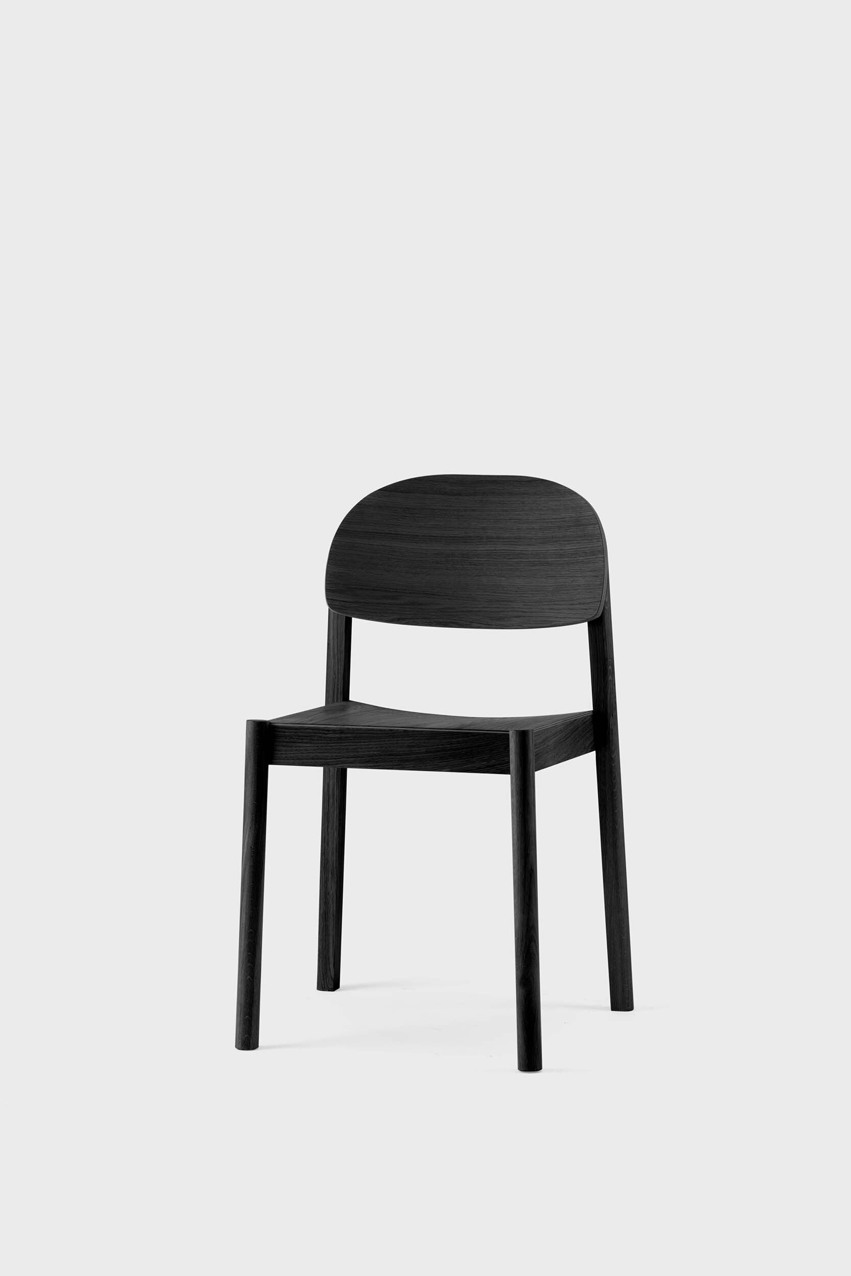 Citizen Dining Chair featuring a minimalist design with rounded legs and a square seat, crafted from sustainable solid oak and veneered plywood.