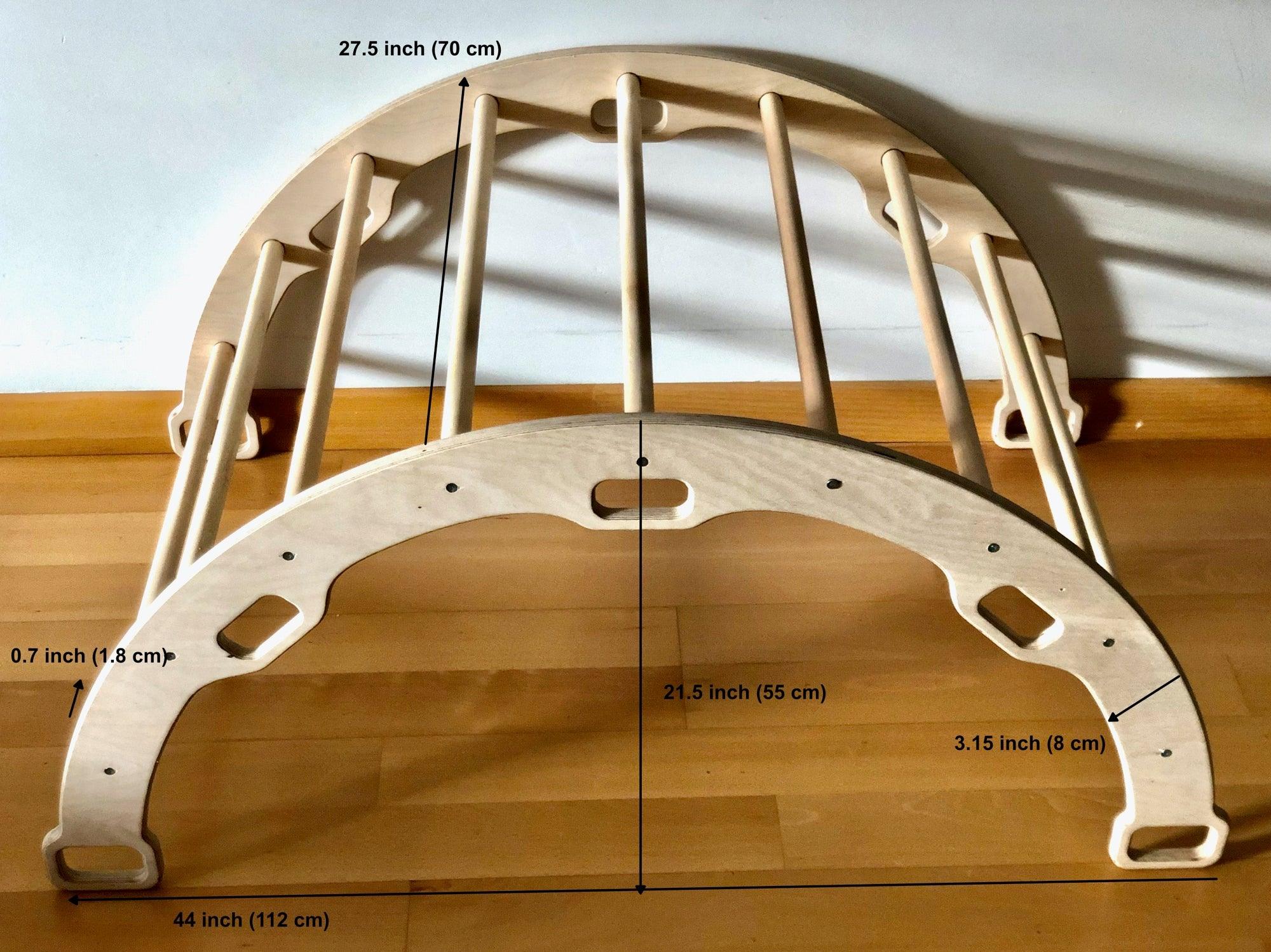 A wooden climbing arch and rocker set with two ramps designed for toddlers, showcasing natural materials and safe construction.