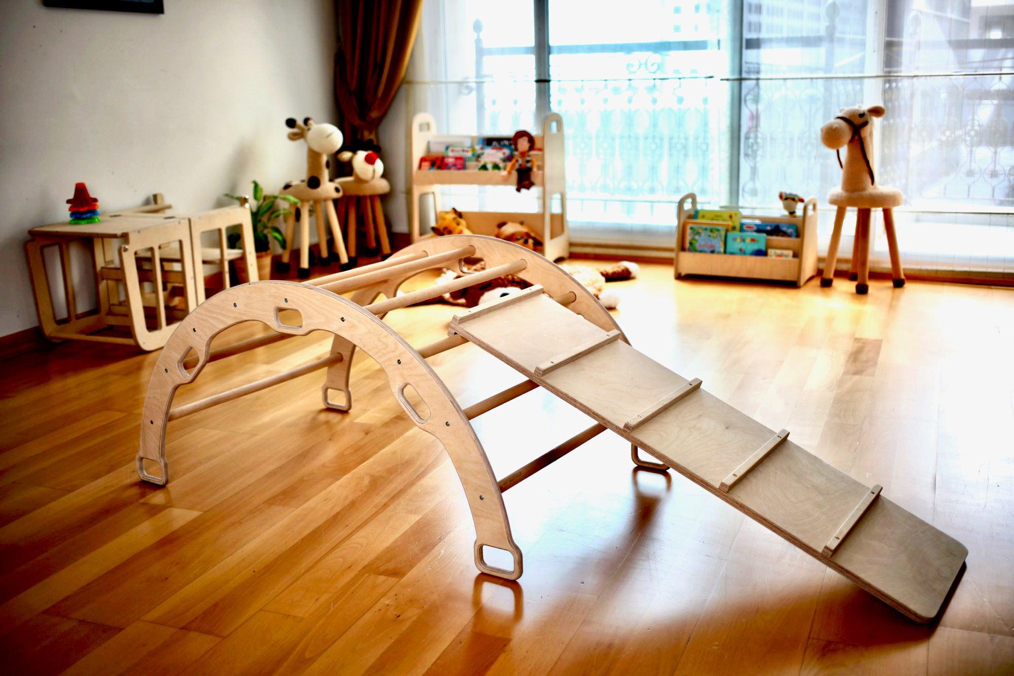 A wooden climbing frame set featuring an arch ladder and ramp, made from natural birch plywood and linden wood, designed for toddlers.