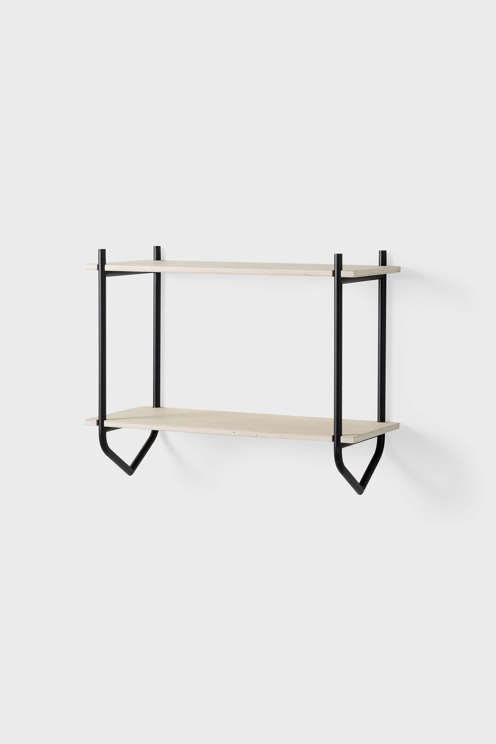 The Dessus Wall Shelf featuring two birch plywood shelves supported by arch metal frames in off white and coal black colors.