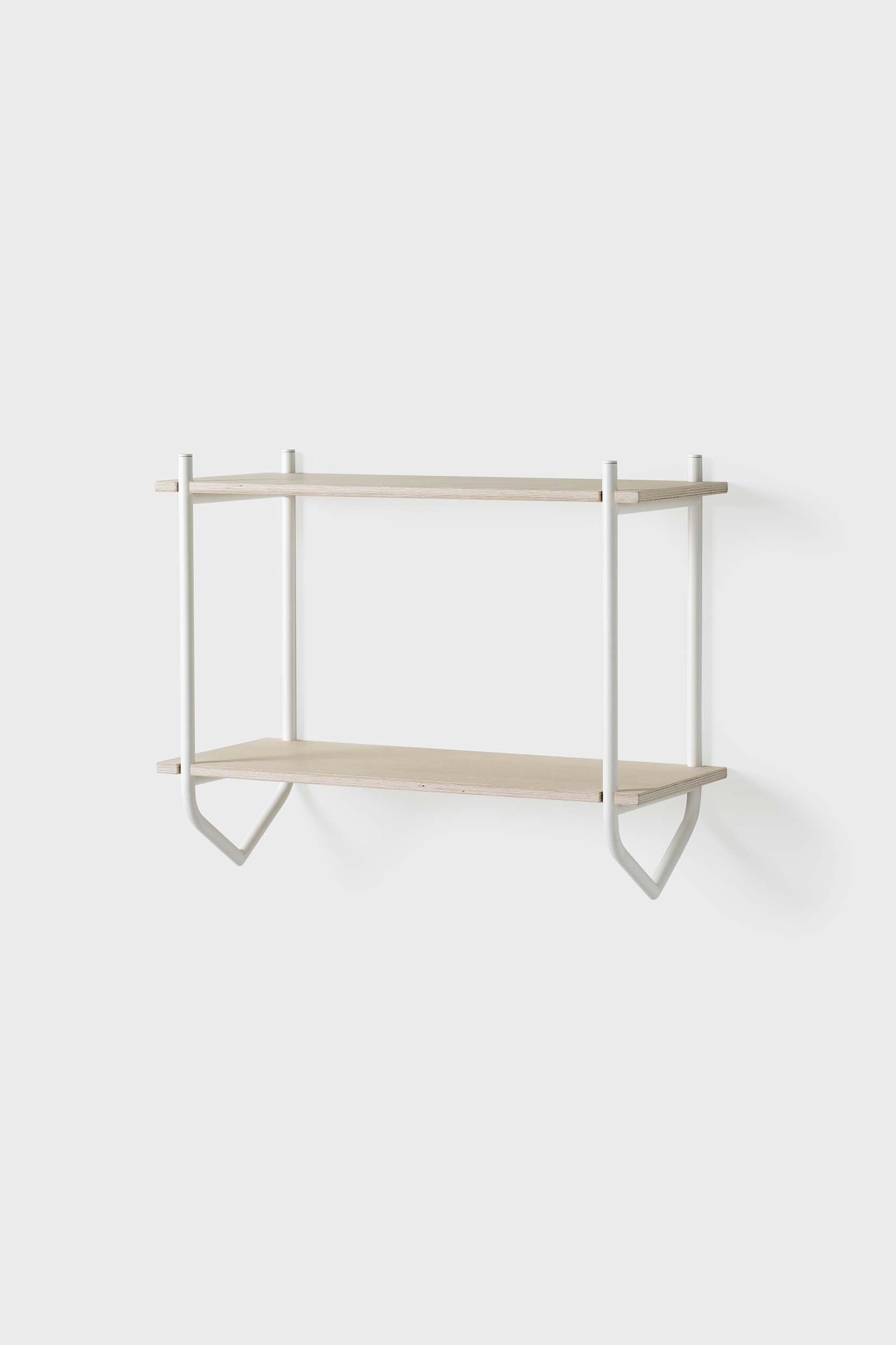 The Dessus Wall Shelf featuring two birch plywood shelves supported by arch metal frames in off white and coal black colors.