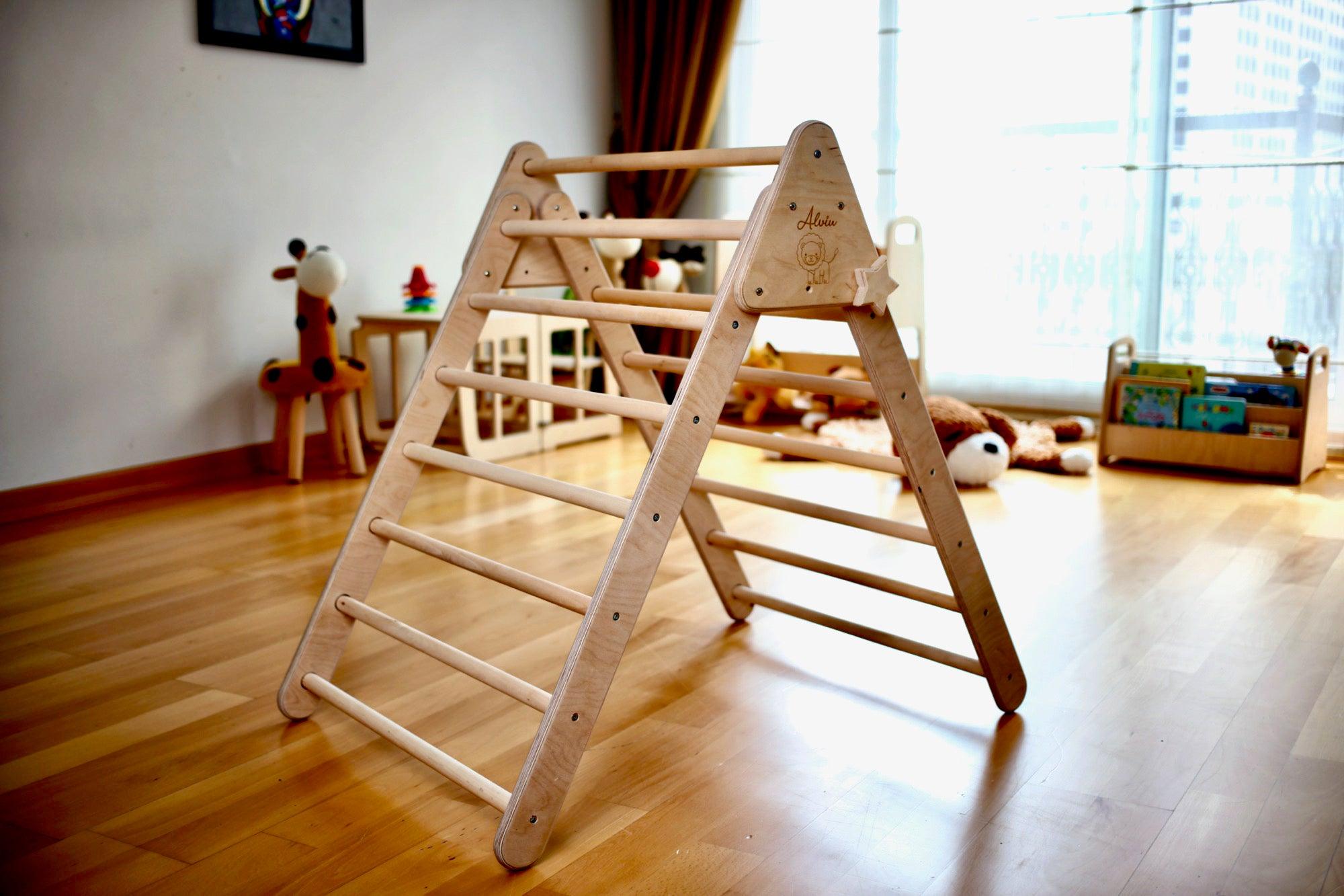 Foldable Climbing Triangle set made of natural birch plywood and linden wood, designed for toddlers to enhance motor skills and play.