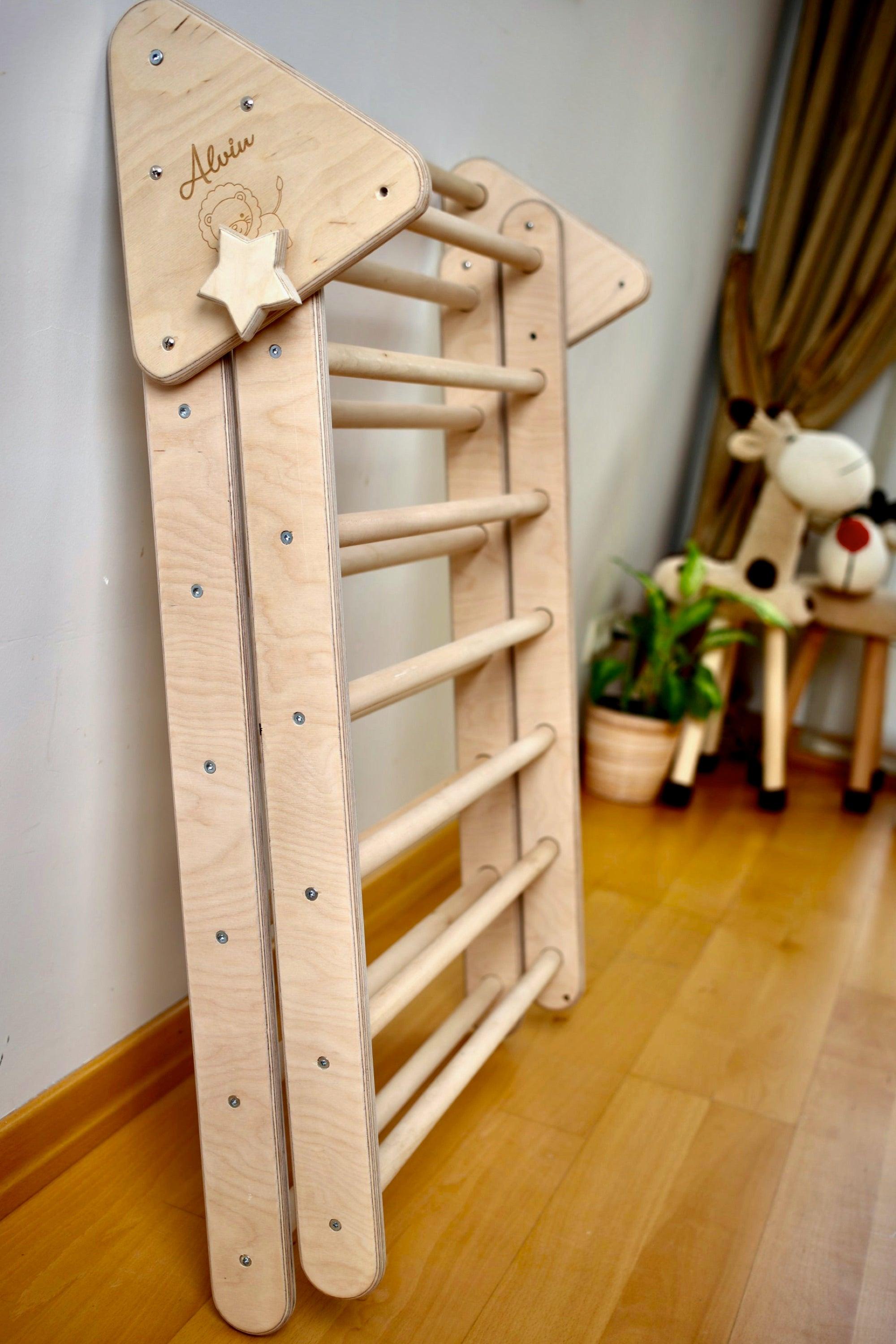 Foldable Climbing Triangle set made of natural birch plywood and linden wood, designed for toddlers to enhance motor skills and play.