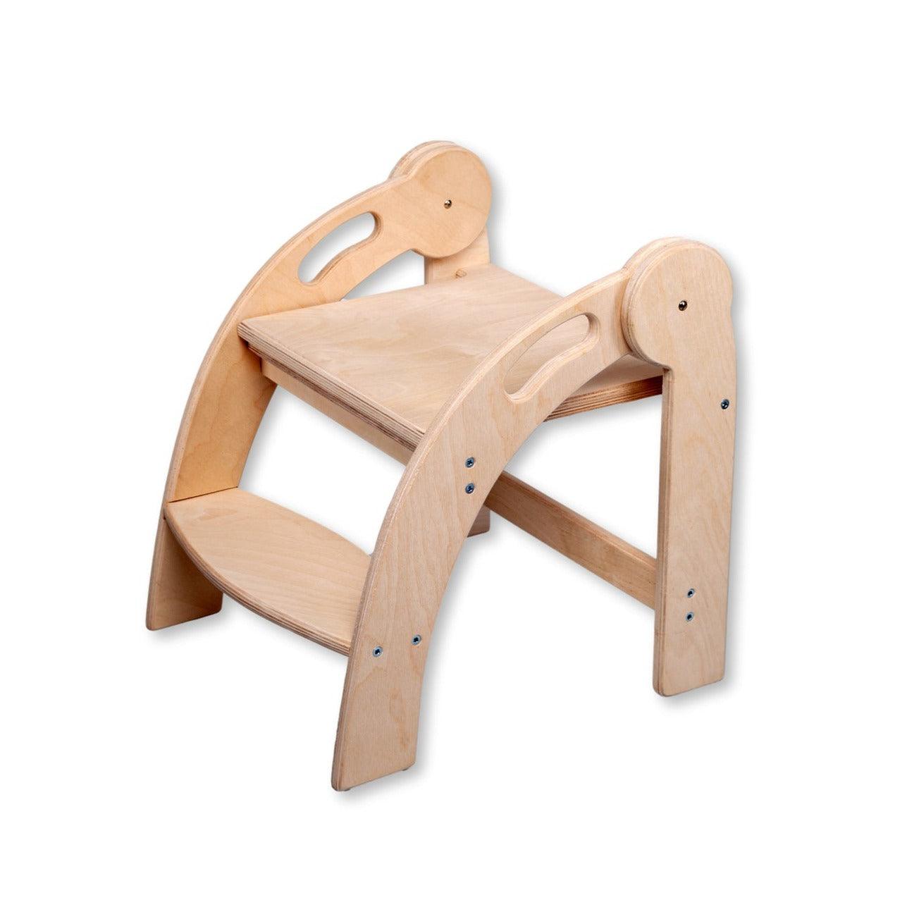 Foldable Montessori Kitchen Step Stool made of natural birch plywood, featuring two steps for children to reach higher surfaces safely.