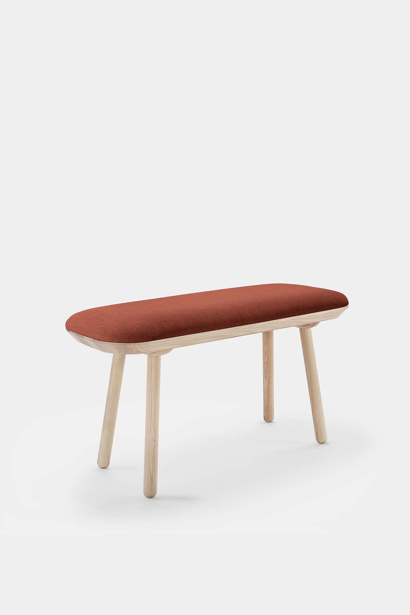 Naïve Bench Upholstered featuring solid wood construction, available in padded and unpadded options, showcasing vibrant colors and sleek design.