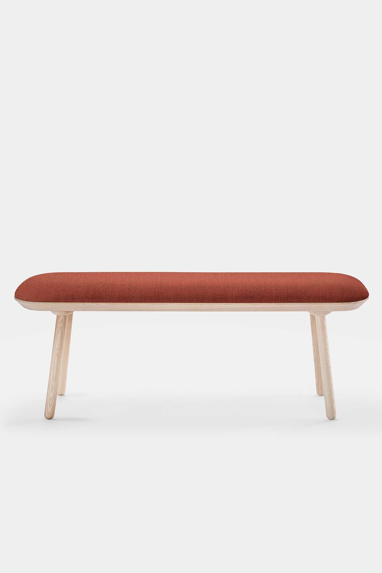 Naïve Bench Upholstered featuring solid wood construction, available in padded and unpadded options, showcasing vibrant colors and sleek design.