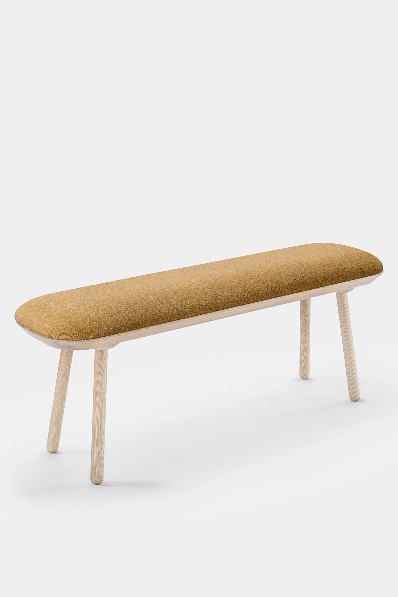 Naïve Bench Upholstered featuring solid wood construction, available in padded and unpadded options, showcasing vibrant colors and sleek design.