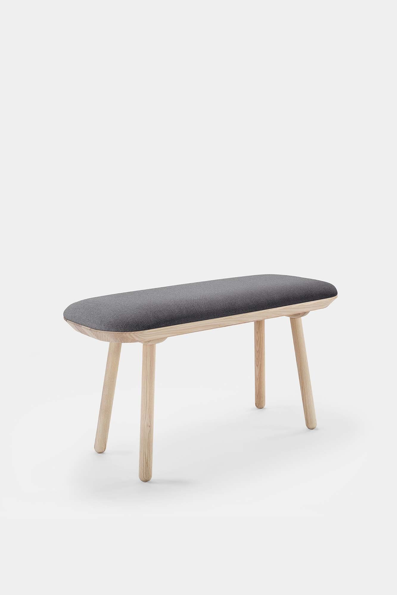 Naïve Bench Upholstered featuring solid wood construction, available in padded and unpadded options, showcasing vibrant colors and sleek design.