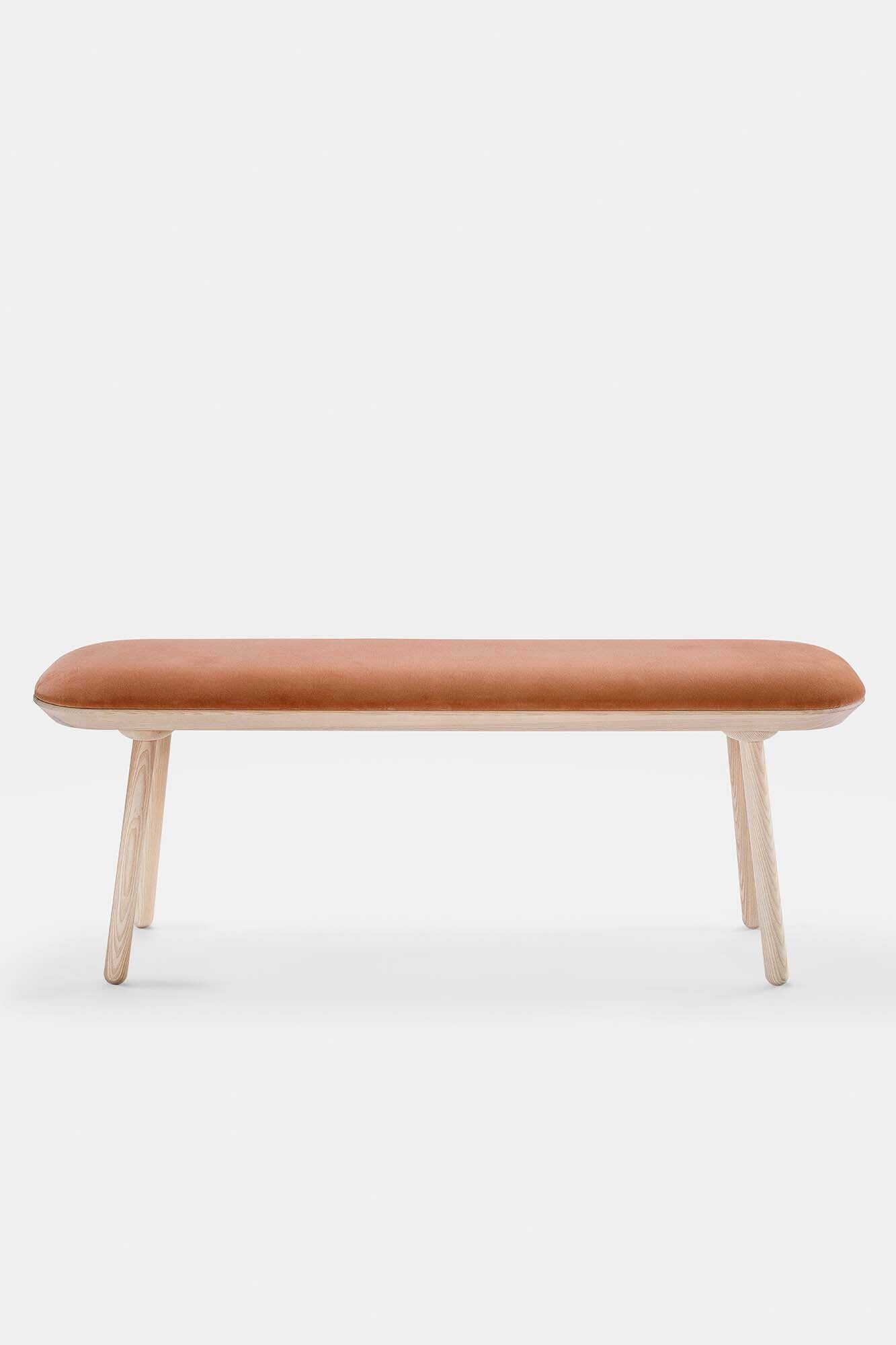 Naïve Bench Upholstered featuring solid wood construction, available in padded and unpadded options, showcasing vibrant colors and sleek design.