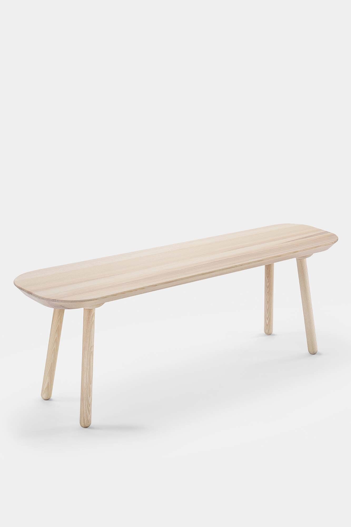 Naïve Bench made from solid wood, showcasing its elegant design and available in padded and unpadded options.