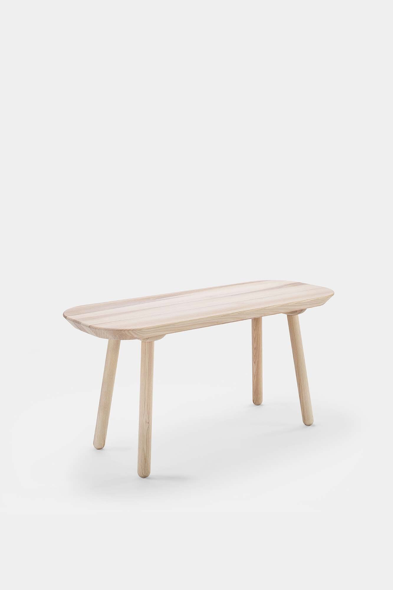 Naïve Bench made from solid wood, showcasing its elegant design and available in padded and unpadded options.