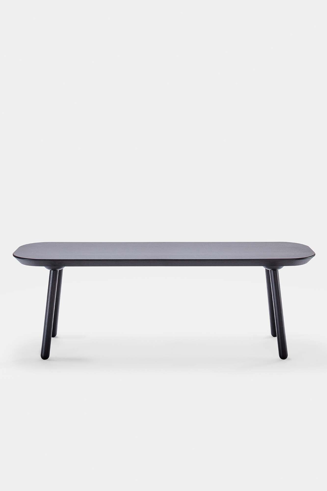 Naïve Bench made from solid wood, showcasing its elegant design and available in padded and unpadded options.