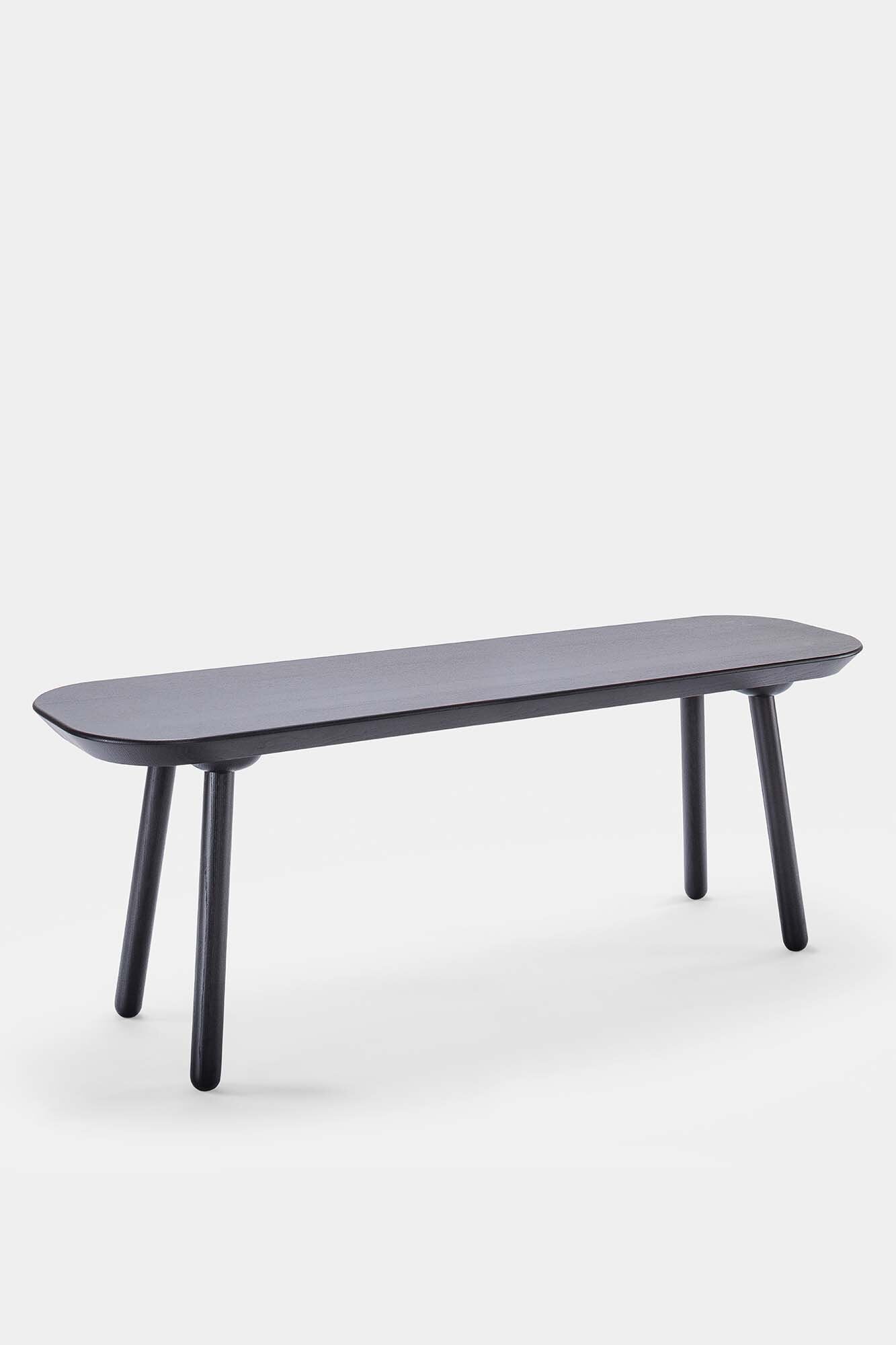 Naïve Bench made from solid wood, showcasing its elegant design and available in padded and unpadded options.