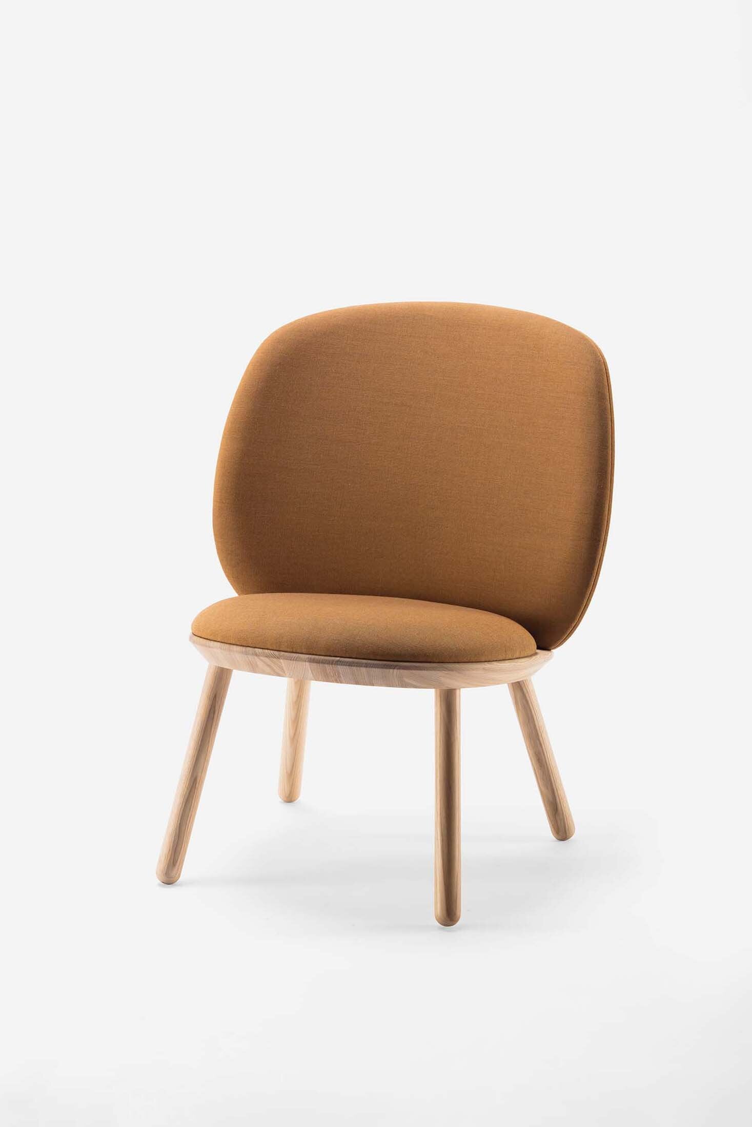 Naïve Low Chair featuring a large leather strap, wooden body, and textile upholstery, designed for comfort and style.