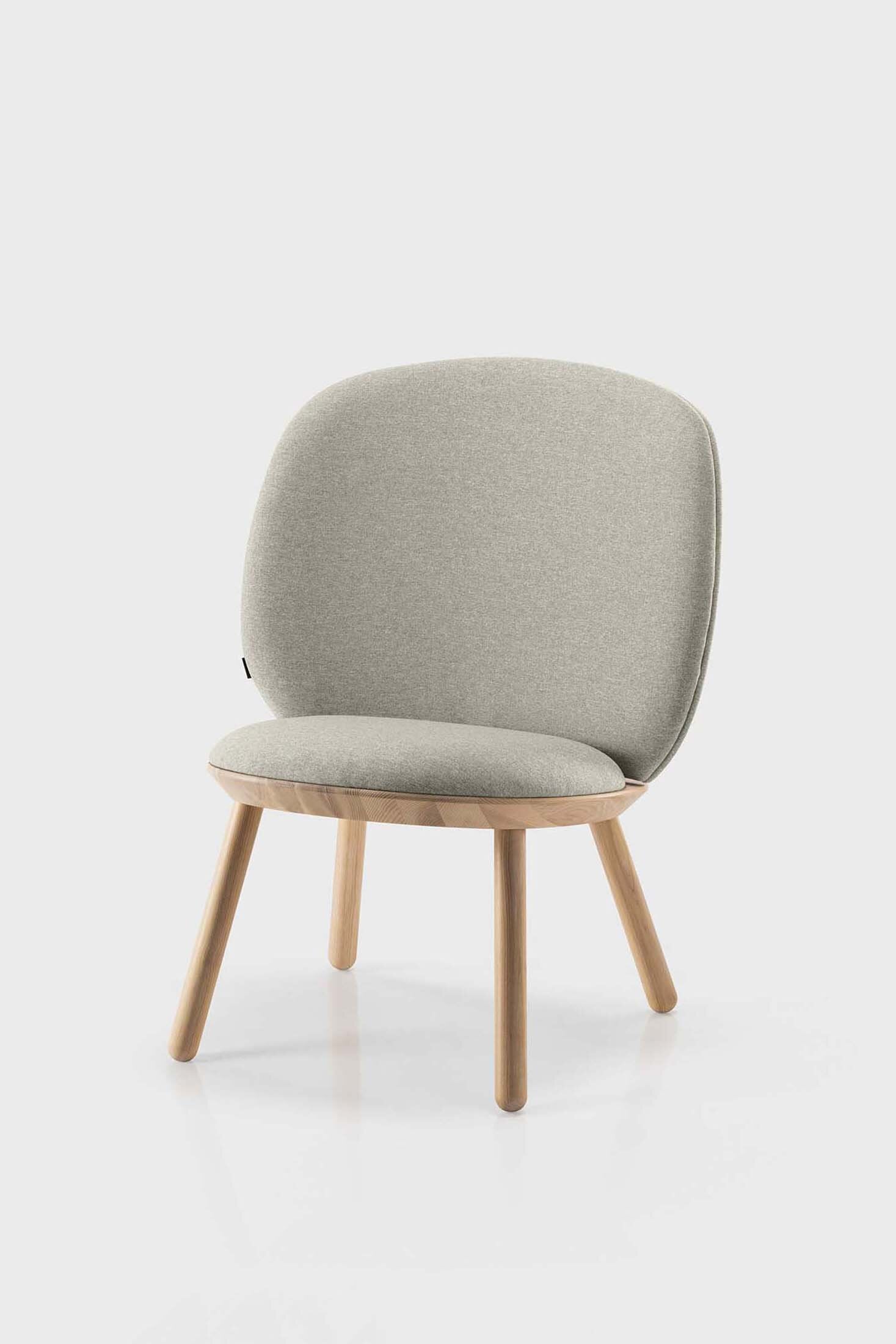 Naïve Low Chair featuring a large leather strap, wooden body, and textile upholstery, designed for comfort and style.