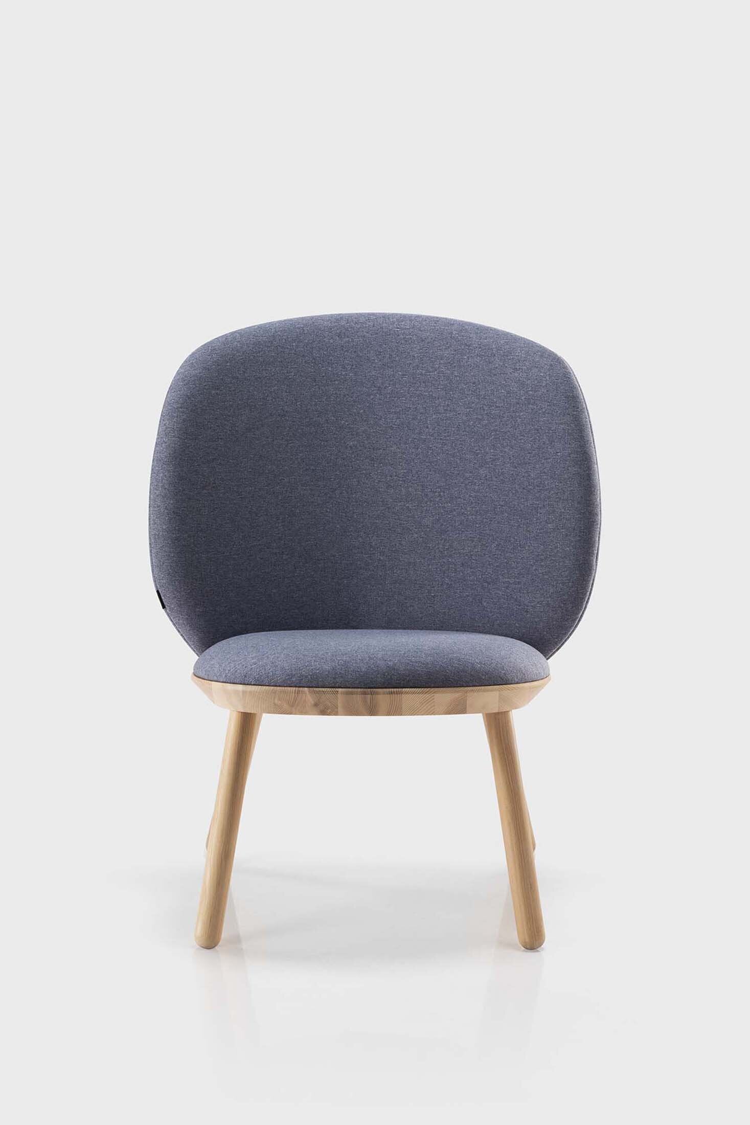 Naïve Low Chair featuring a large leather strap, wooden body, and textile upholstery, designed for comfort and style.