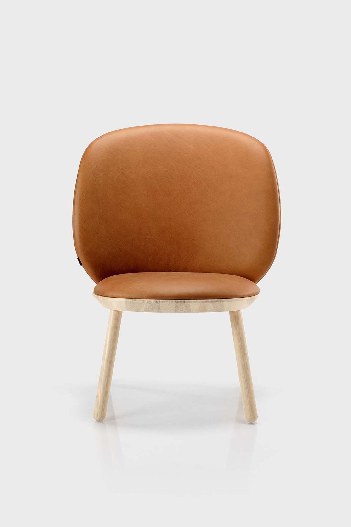 Naïve Low Chair featuring a large leather strap, wooden body, and textile upholstery, designed for comfort and style.