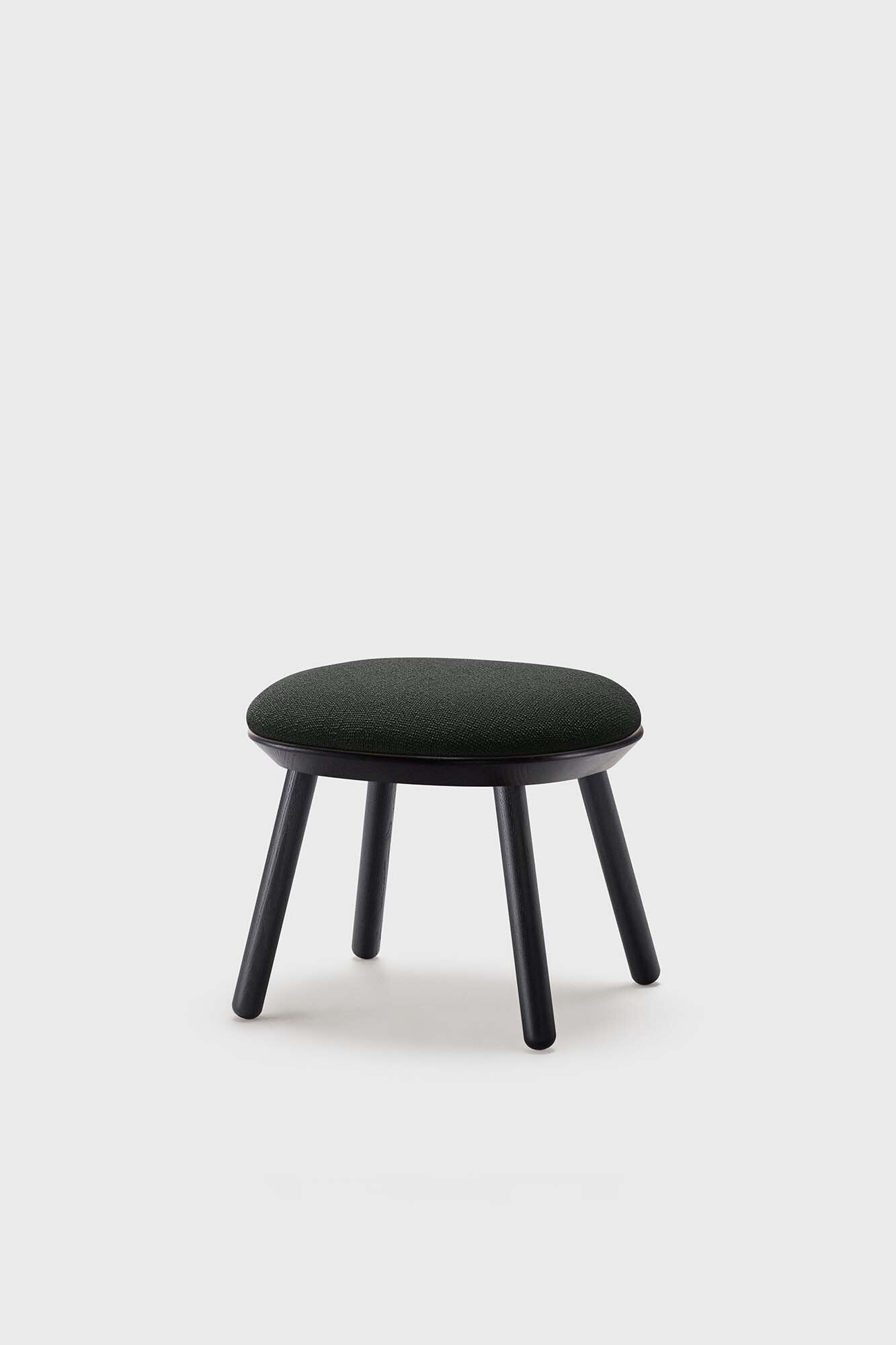 Naïve Ottoman featuring a soft padded top and a sturdy black or oiled ash wood frame, available in various colors, perfect for any living space.