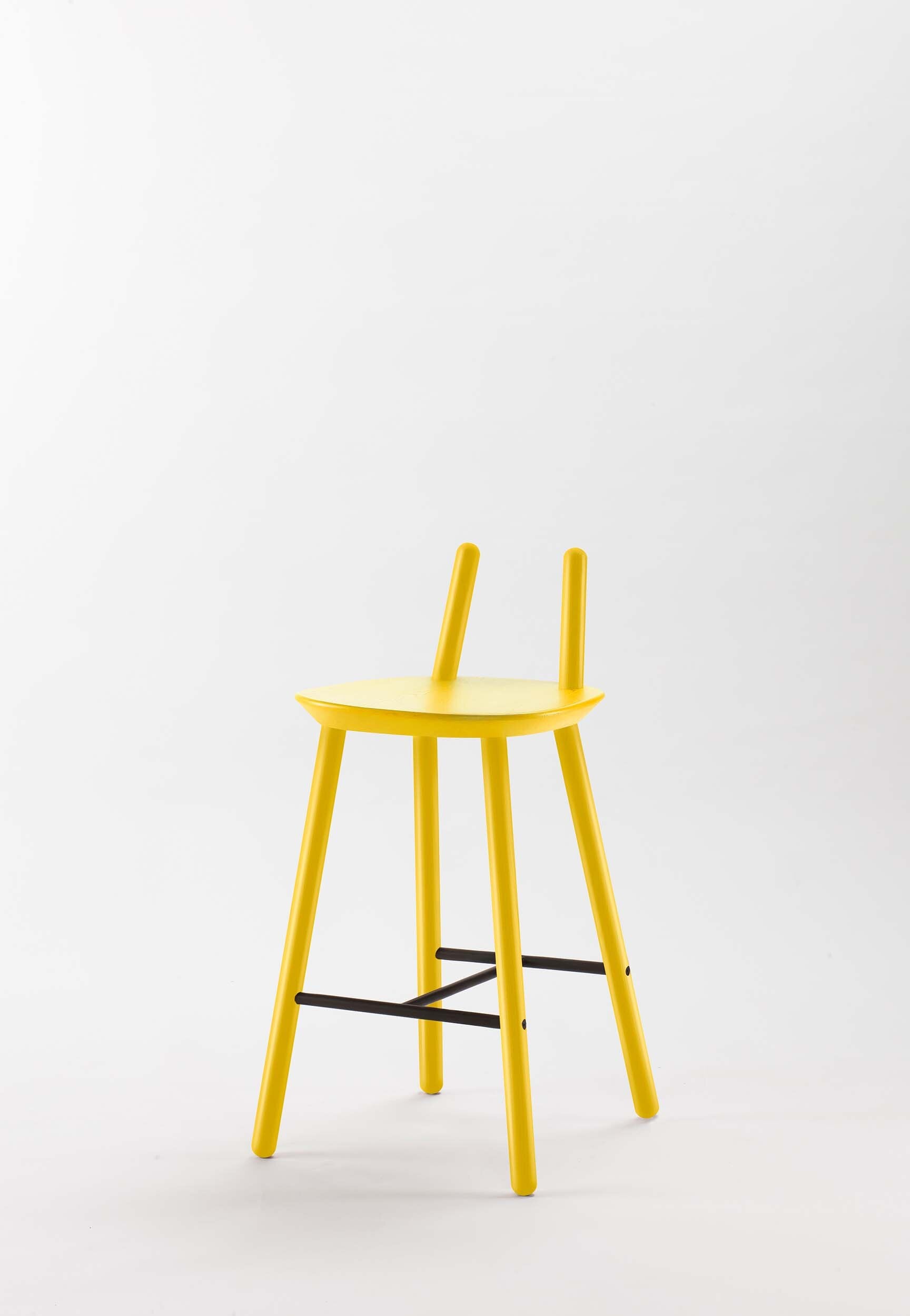 Naïve Semi Bar Stool featuring a carved seat and minimal backrest, with a durable steel footrest, ideal for home and public use.