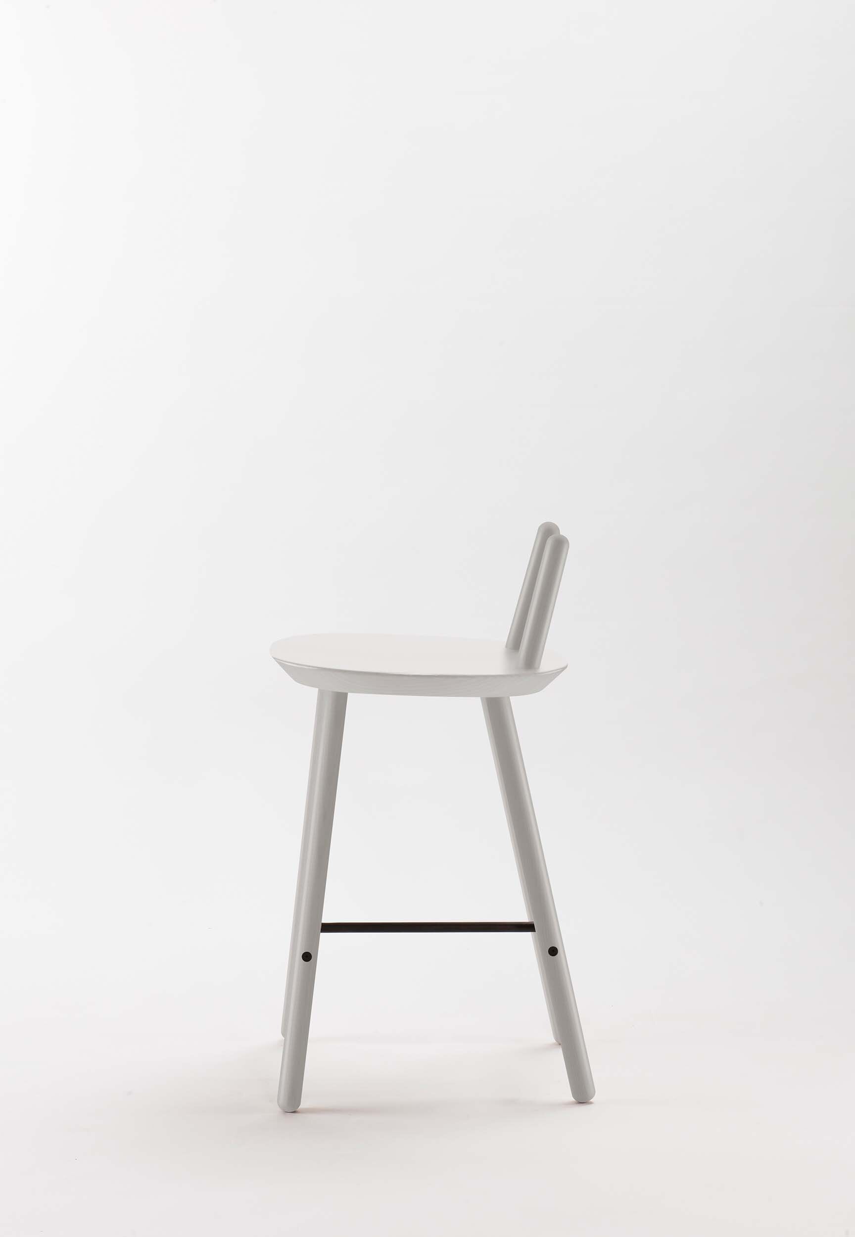 Naïve Semi Bar Stool featuring a carved seat and minimal backrest, with a durable steel footrest, ideal for home and public use.