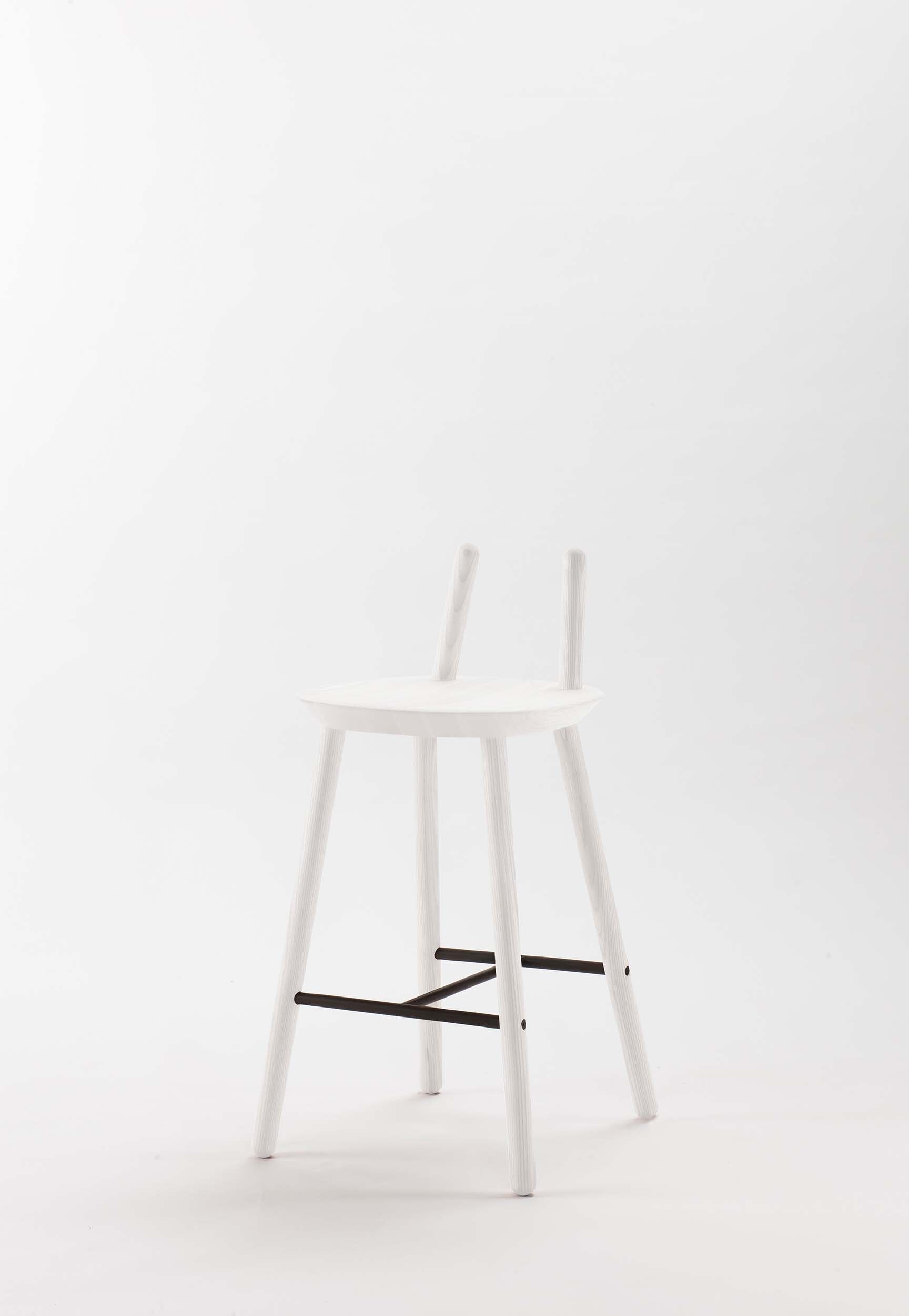 Naïve Semi Bar Stool featuring a carved seat and minimal backrest, with a durable steel footrest, ideal for home and public use.