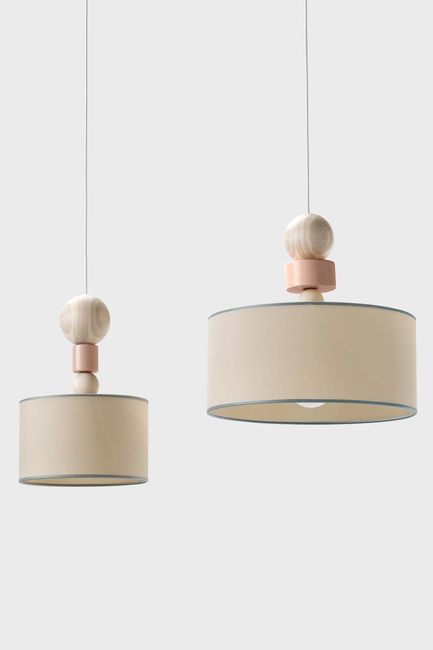 Spiedino Pendant Lamp featuring elegant design with solid ash and fabric elements, showcasing its Italian craftsmanship and sustainable materials.