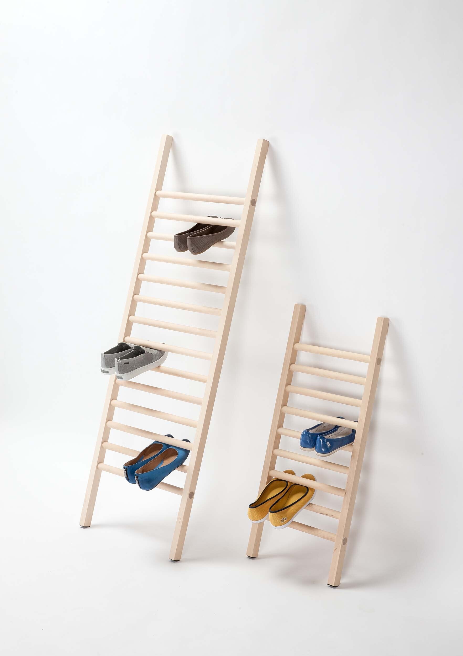 Step Up Shoe Rack by Tore Bleuzé, featuring a minimalist design for stylish shoe organization against a wall.