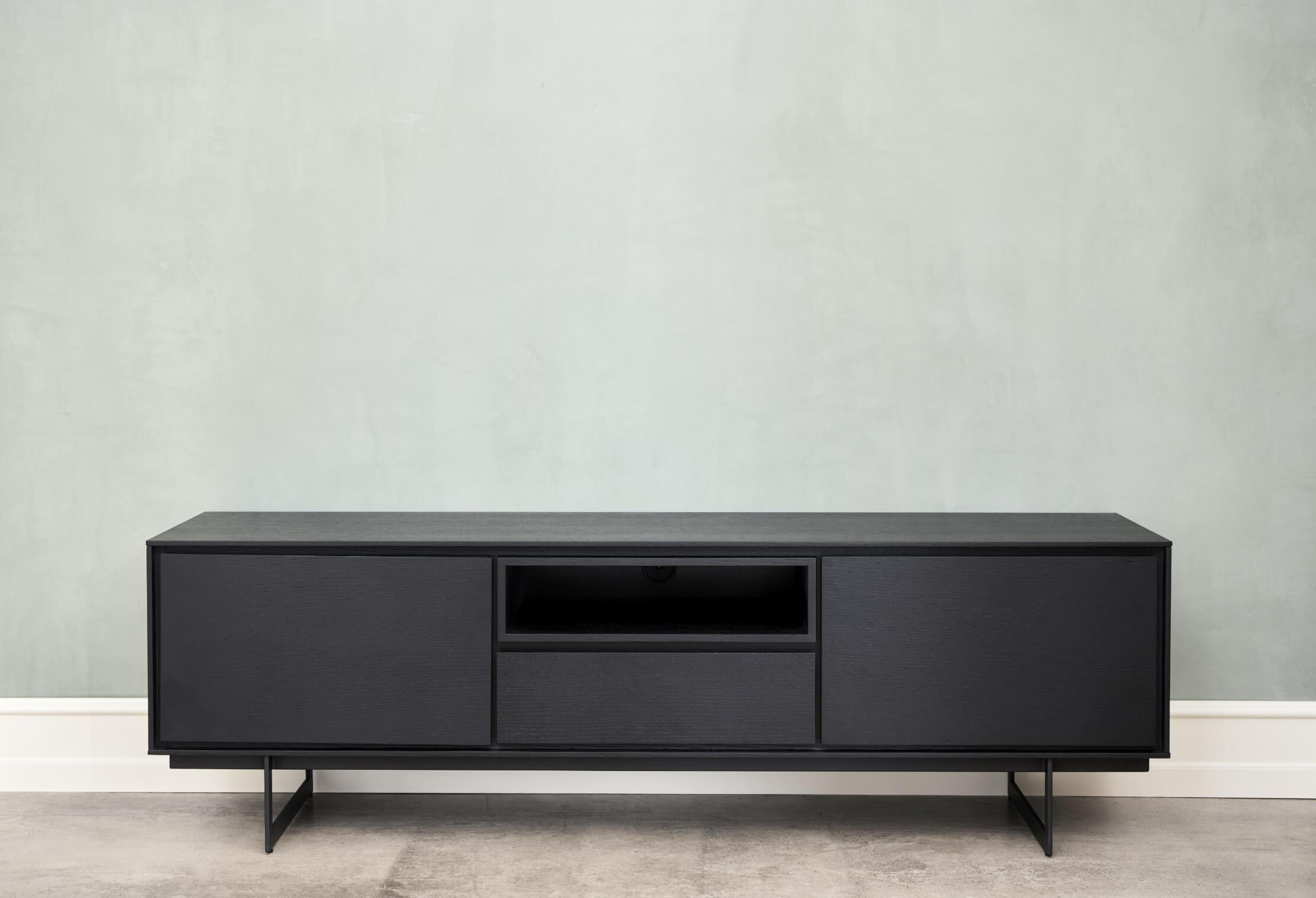 Tokyo Black Oak TV Table featuring minimalist design and elegant black oak veneer.