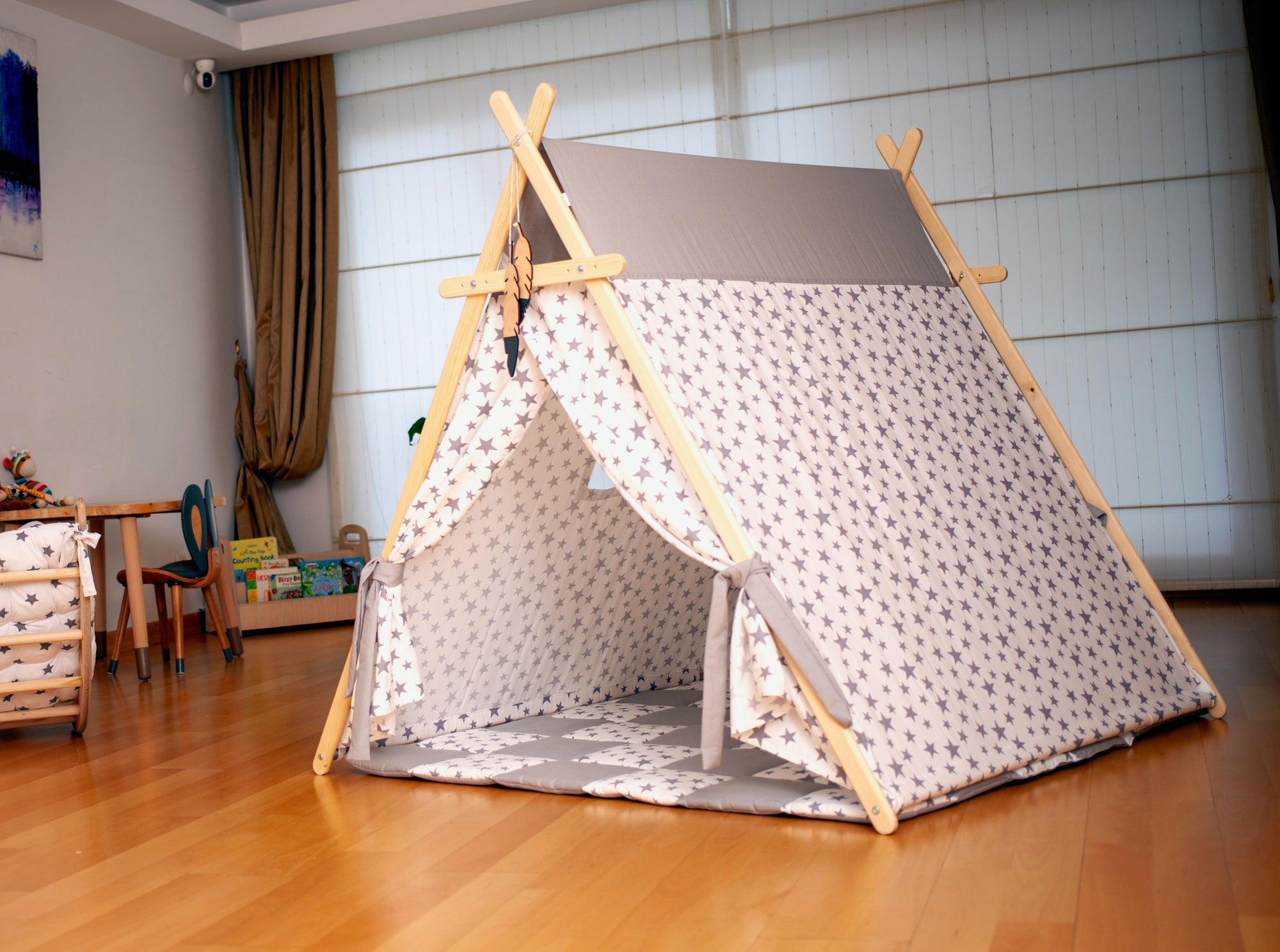 White Stars Play Tent with wooden poles and non-slip mat, featuring star lights for a cozy play area.