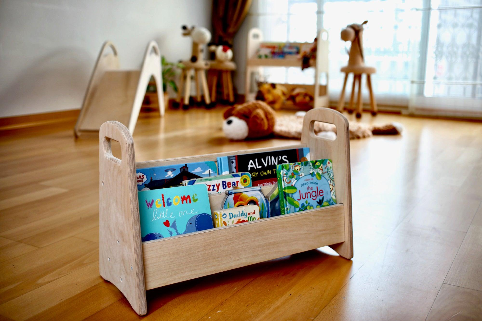 A colorful wooden bookshelf designed for children, featuring multiple shelves at a lower height for easy access to books.