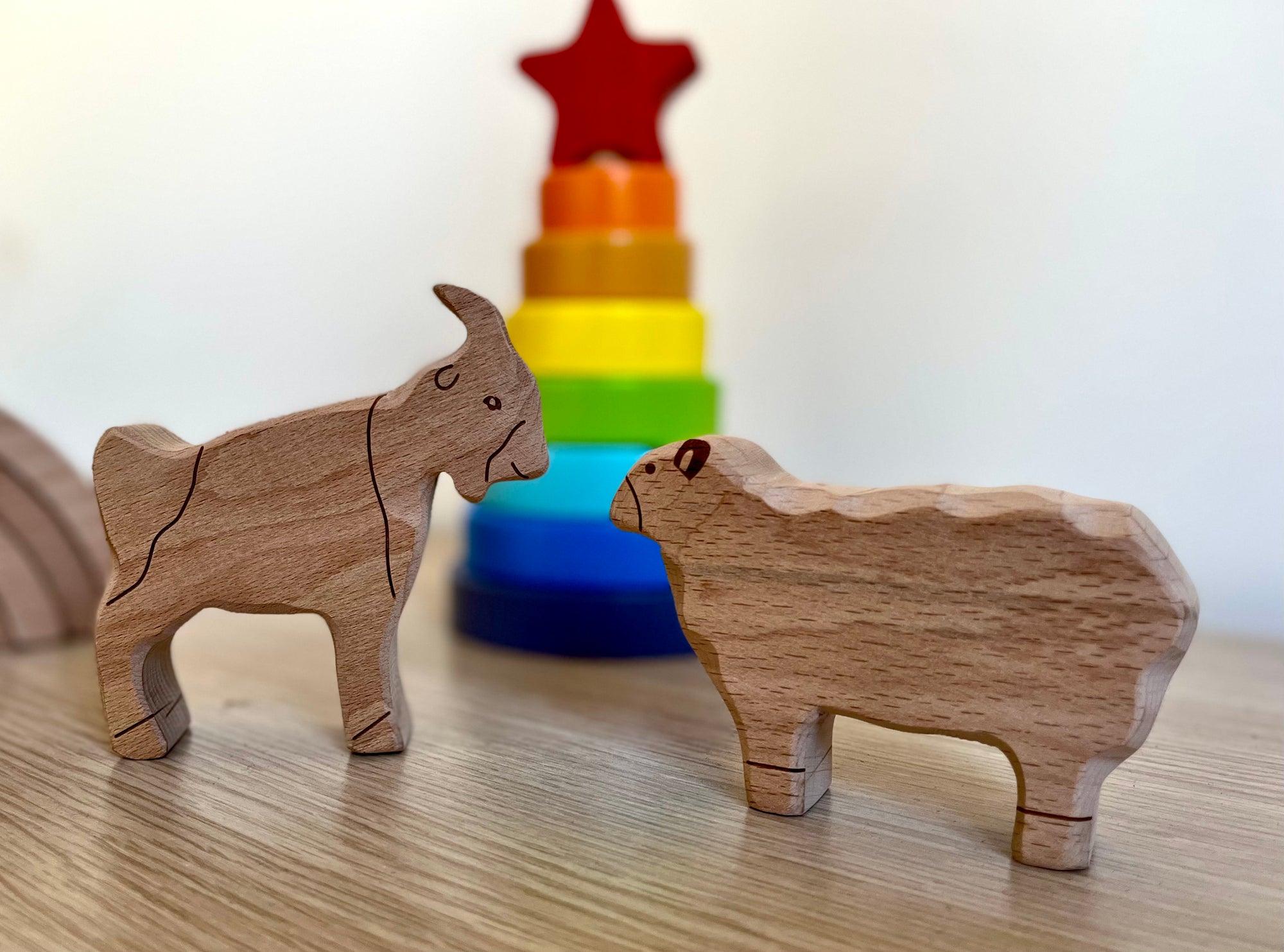 A colorful Wooden Farm Animals Set featuring intricately designed figures of cows, horses, pigs, ducks, and chickens, perfect for children's imaginative play.