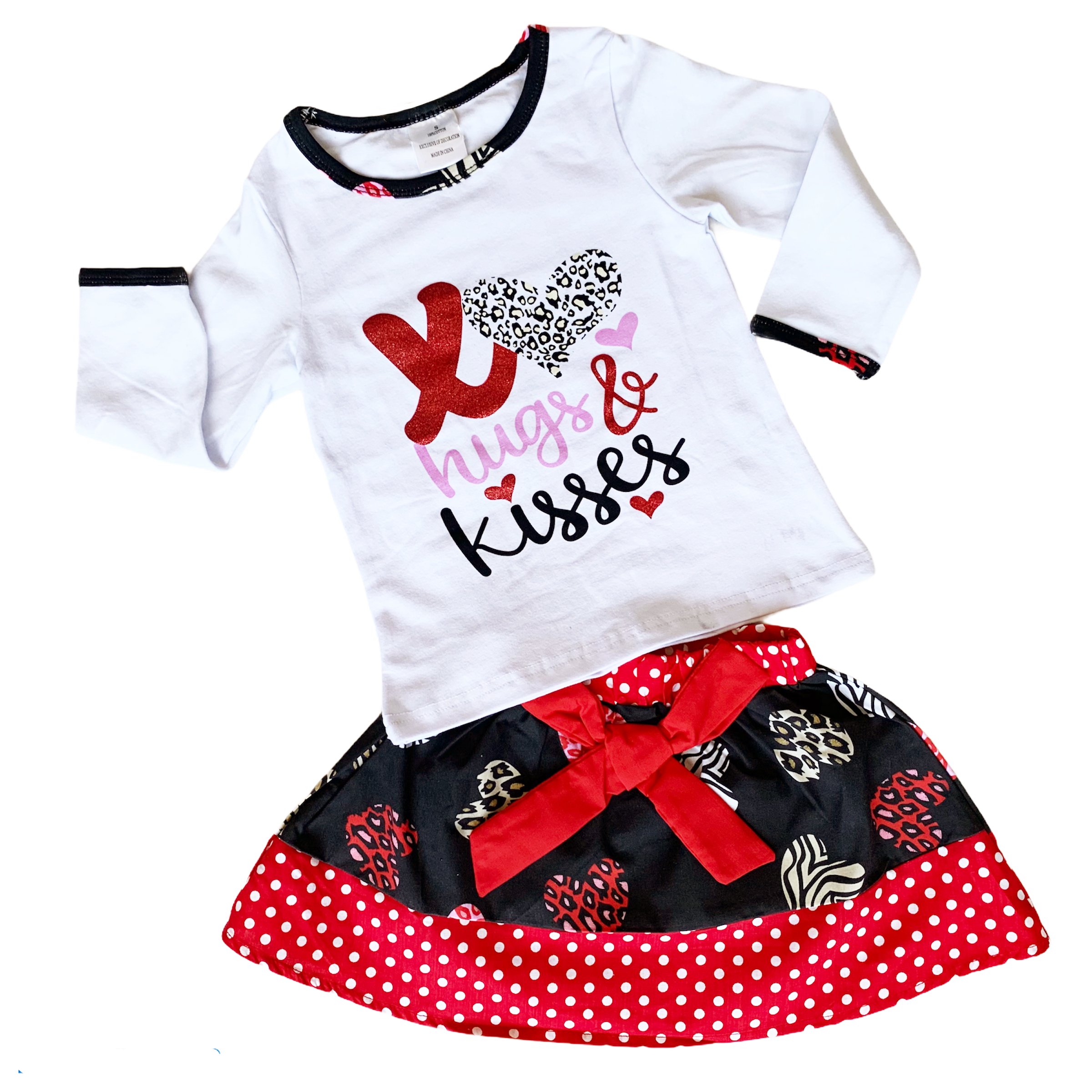 AL Limited Girls Valentine's Day Long Sleeve Shirt with Hearts Skirt Set featuring XO Hugs & Kisses design and a big red bow.