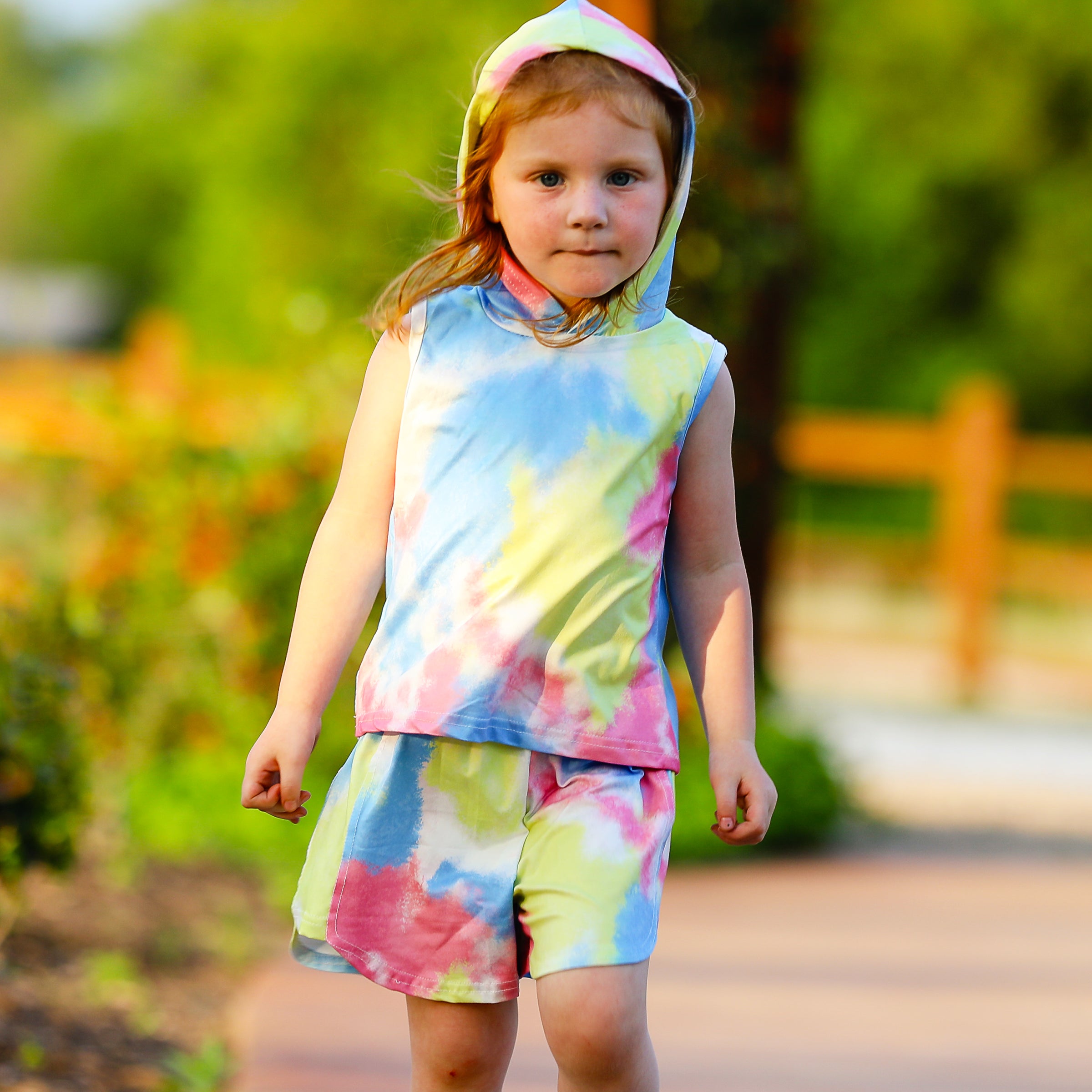 AL Limited pastel tie dye hoodie top and shorts set for girls, featuring vibrant yellow, pink, and blue colors, perfect for summer activities.