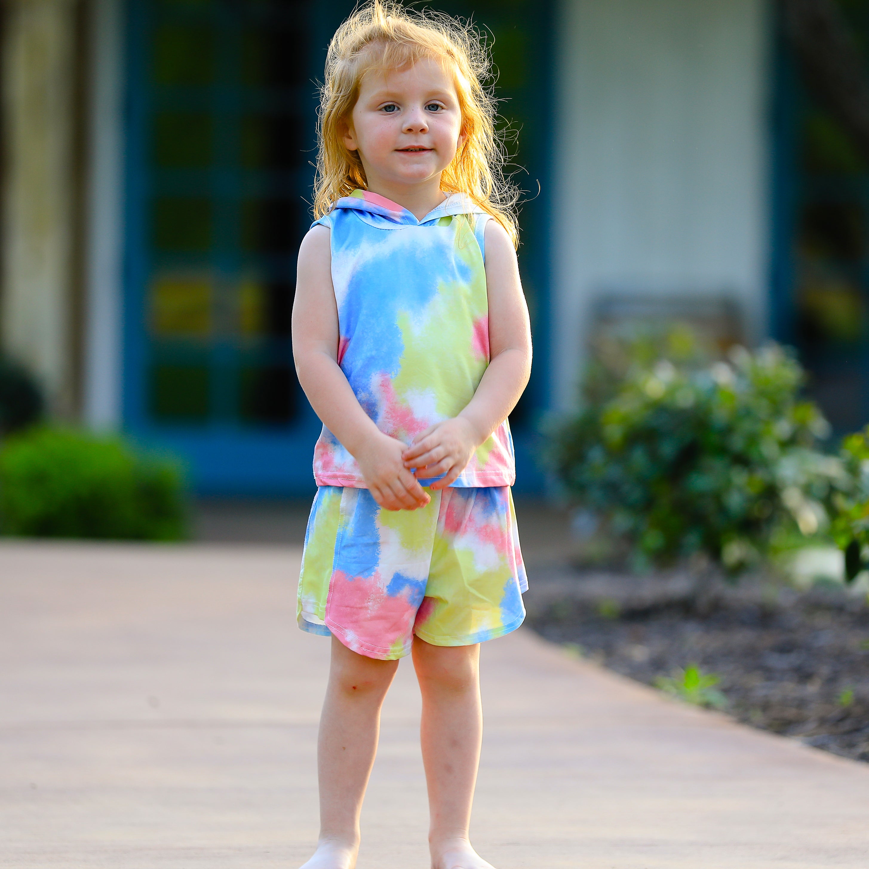 AL Limited pastel tie dye hoodie top and shorts set for girls, featuring vibrant yellow, pink, and blue colors, perfect for summer activities.