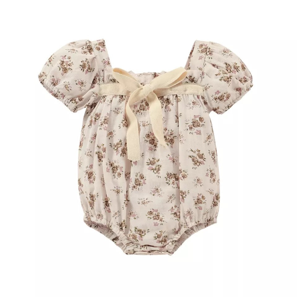 Alice Vintage Romper made of soft cotton, featuring a classic vintage design with adjustable straps and a flattering fit.