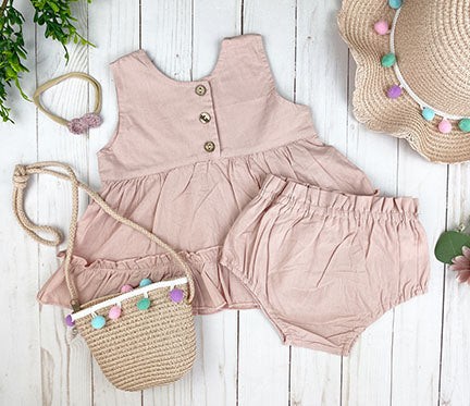 Amelia 2 pc set in rose featuring a tank top with wooden buttons and matching bloomer shorts with an elastic waistband.