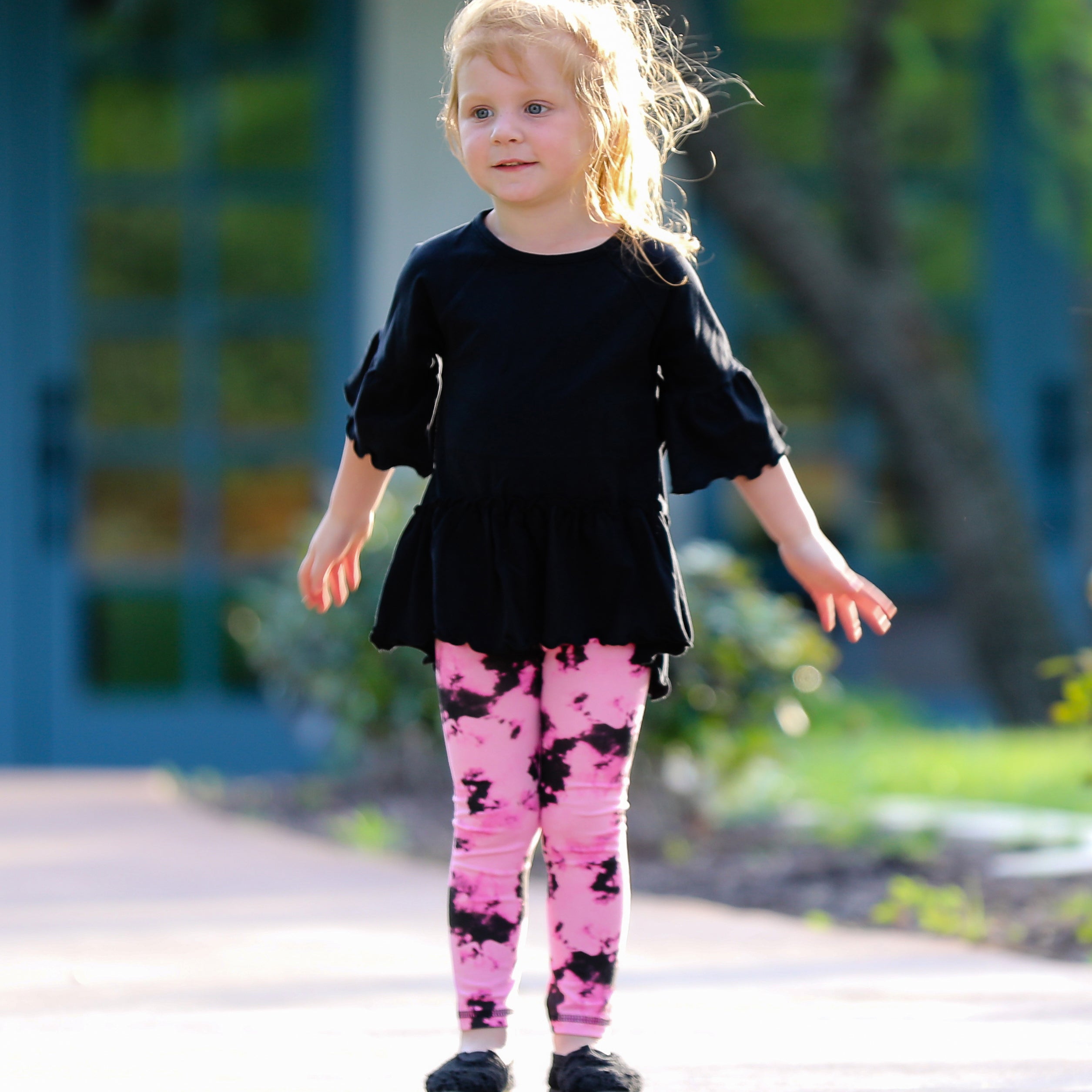 AnnLoren Baby Toddler Big Girls Boutique leggings featuring vibrant pink and black tie dye design with ruffles and thick elastic waistband.