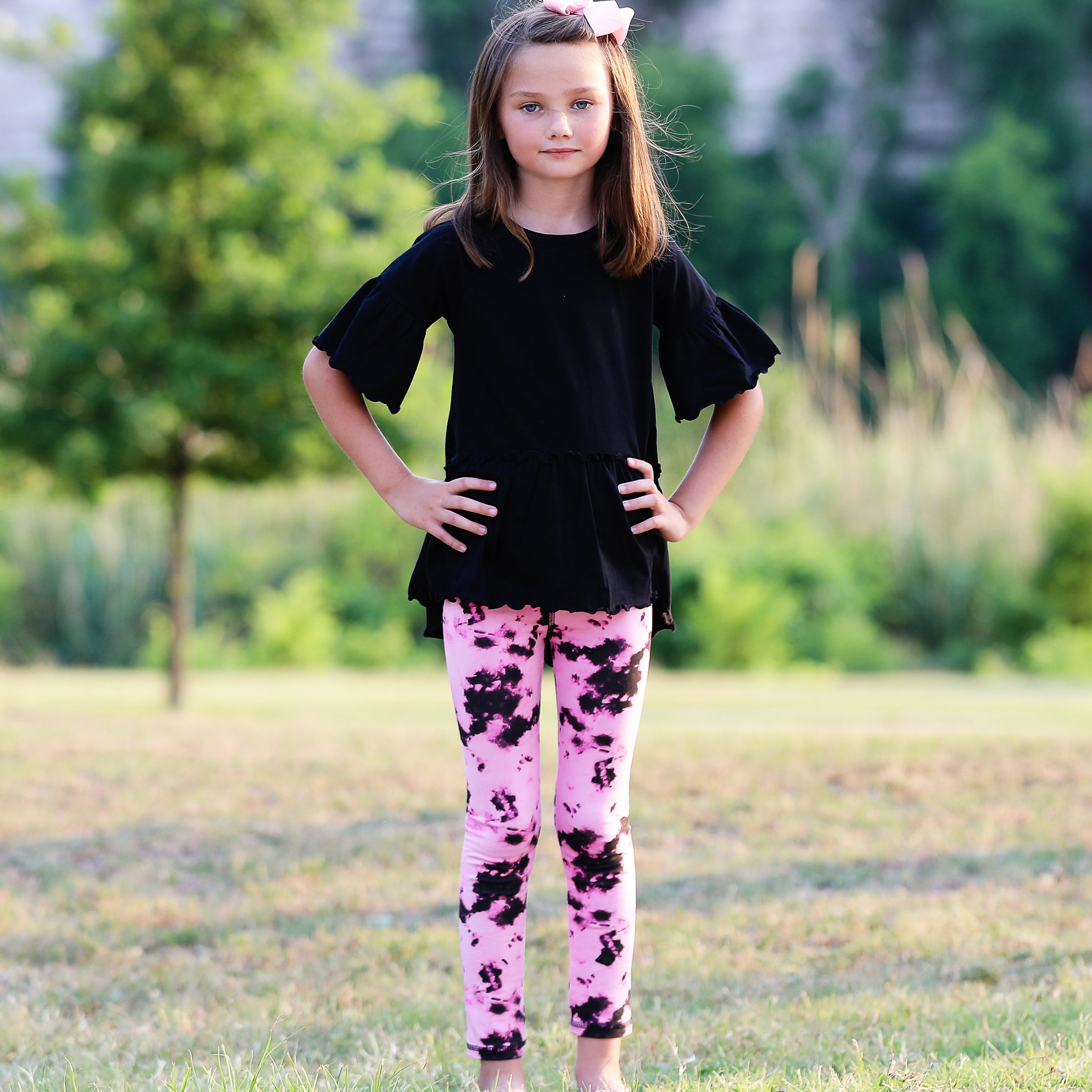 AnnLoren Baby Toddler Big Girls Boutique leggings featuring vibrant pink and black tie dye design with ruffles and thick elastic waistband.