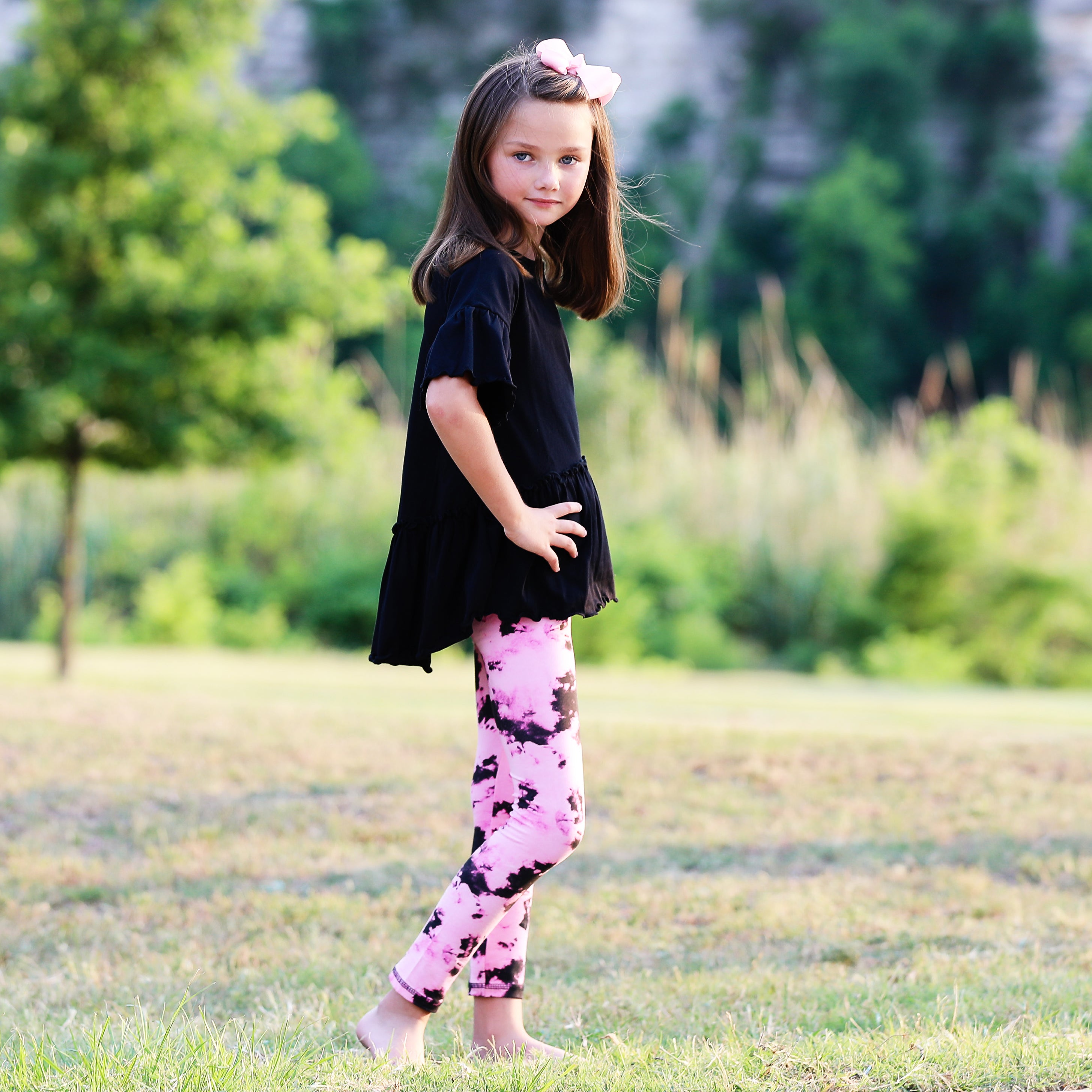 AnnLoren Baby Toddler Big Girls Boutique leggings featuring vibrant pink and black tie dye design with ruffles and thick elastic waistband.