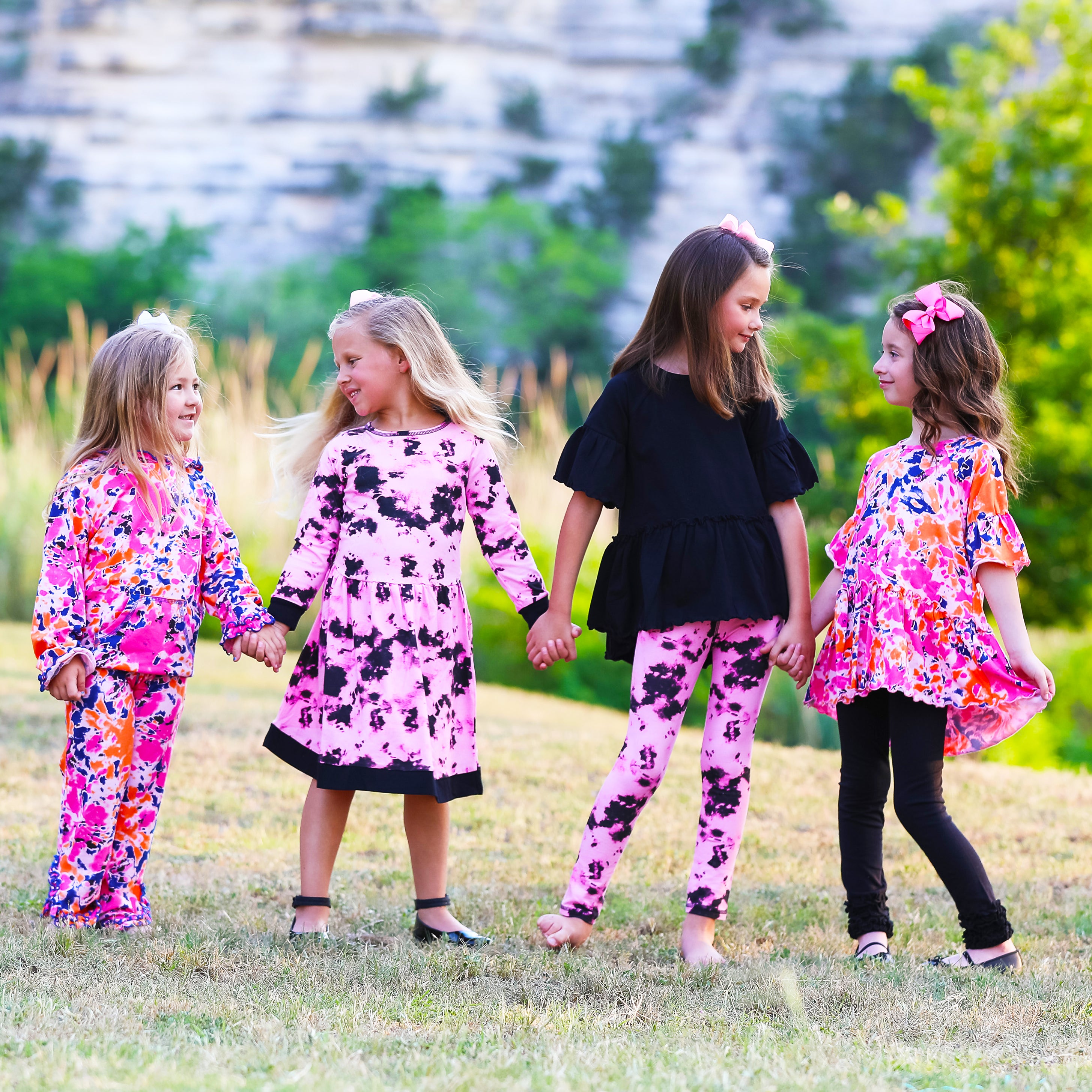 AnnLoren Baby Toddler Big Girls Boutique leggings featuring vibrant pink and black tie dye design with ruffles and thick elastic waistband.