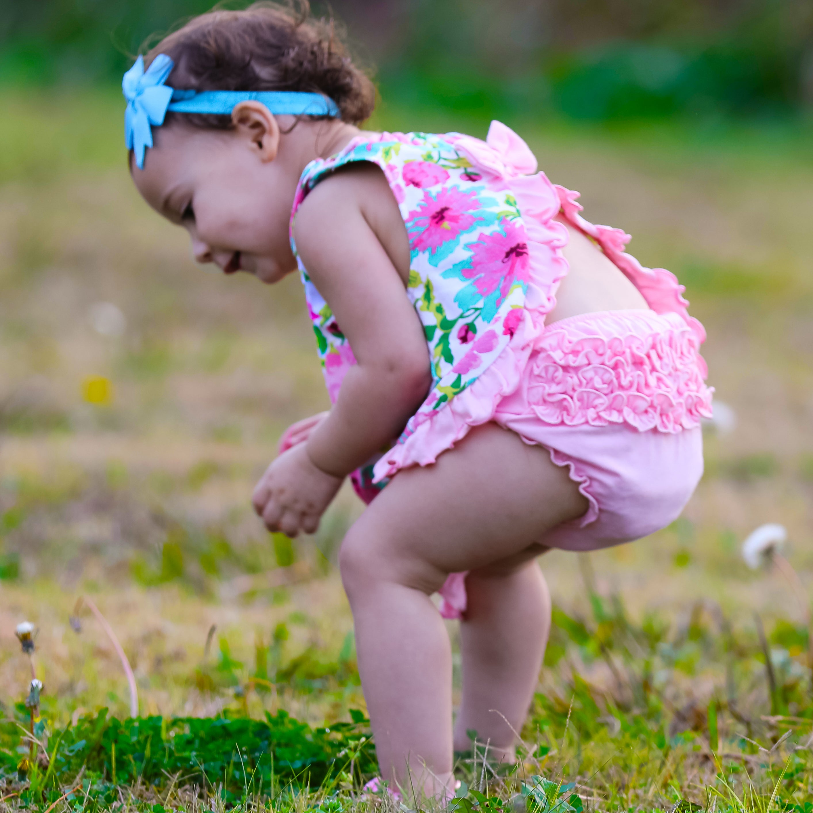 AnnLoren Baby/Toddler Girls Summer Floral Ruffle Swing Tank Top featuring floral patterns and ruffle details, perfect for warm weather.