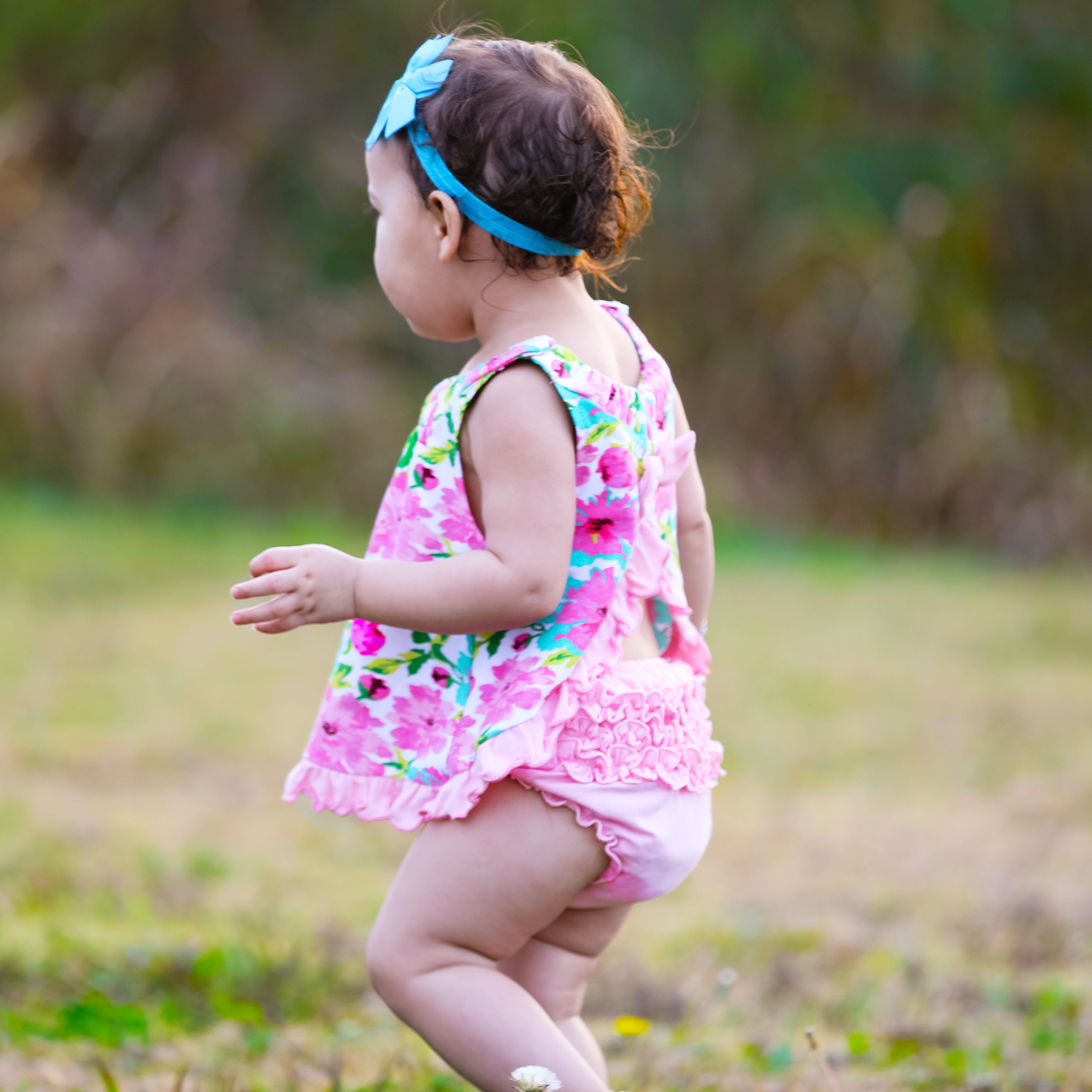 AnnLoren Baby/Toddler Girls Summer Floral Ruffle Swing Tank Top featuring floral patterns and ruffle details, perfect for warm weather.