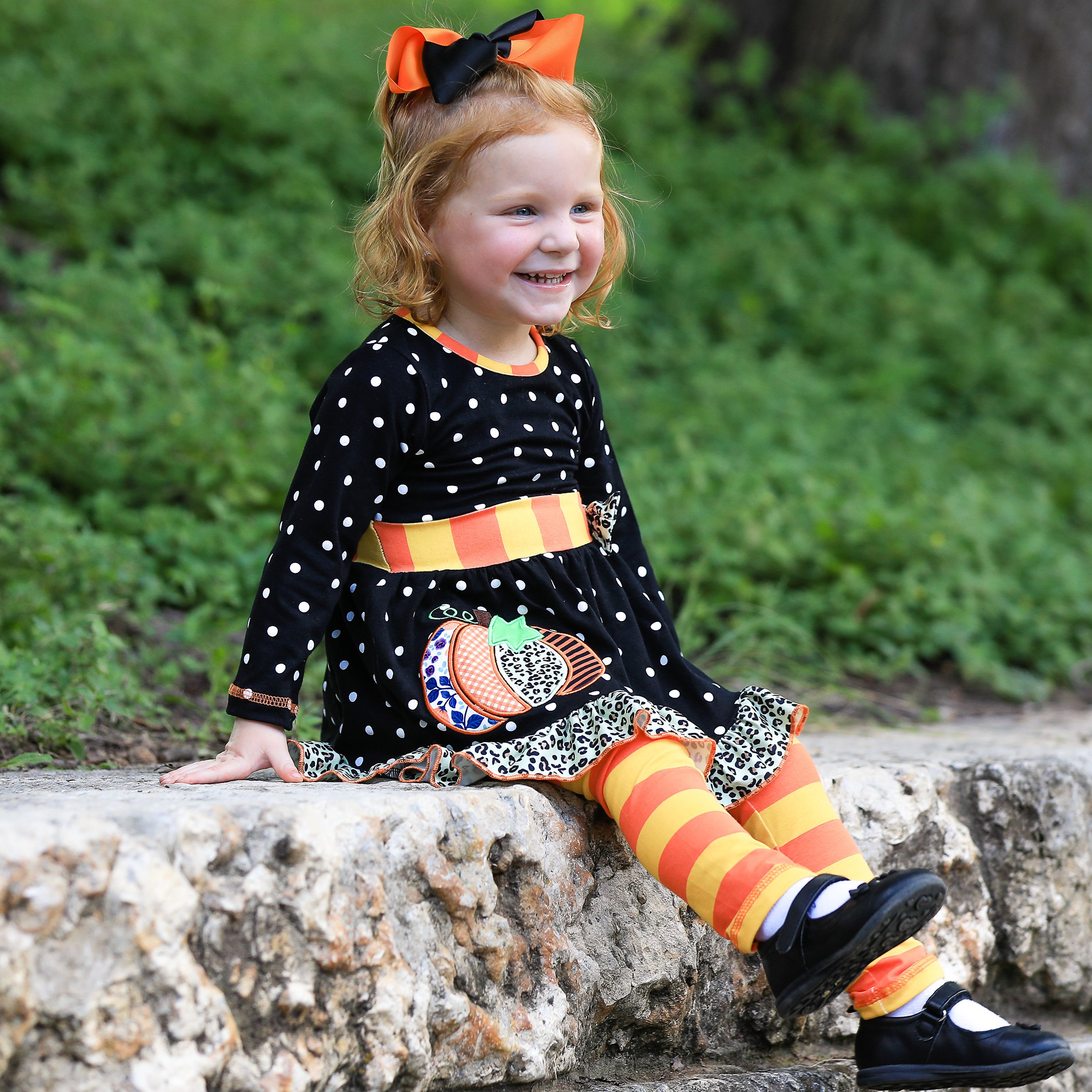 AnnLoren Girls Autumn Dress featuring black polka dots, orange pumpkin embroidery, and matching orange striped leggings with elastic waistband.